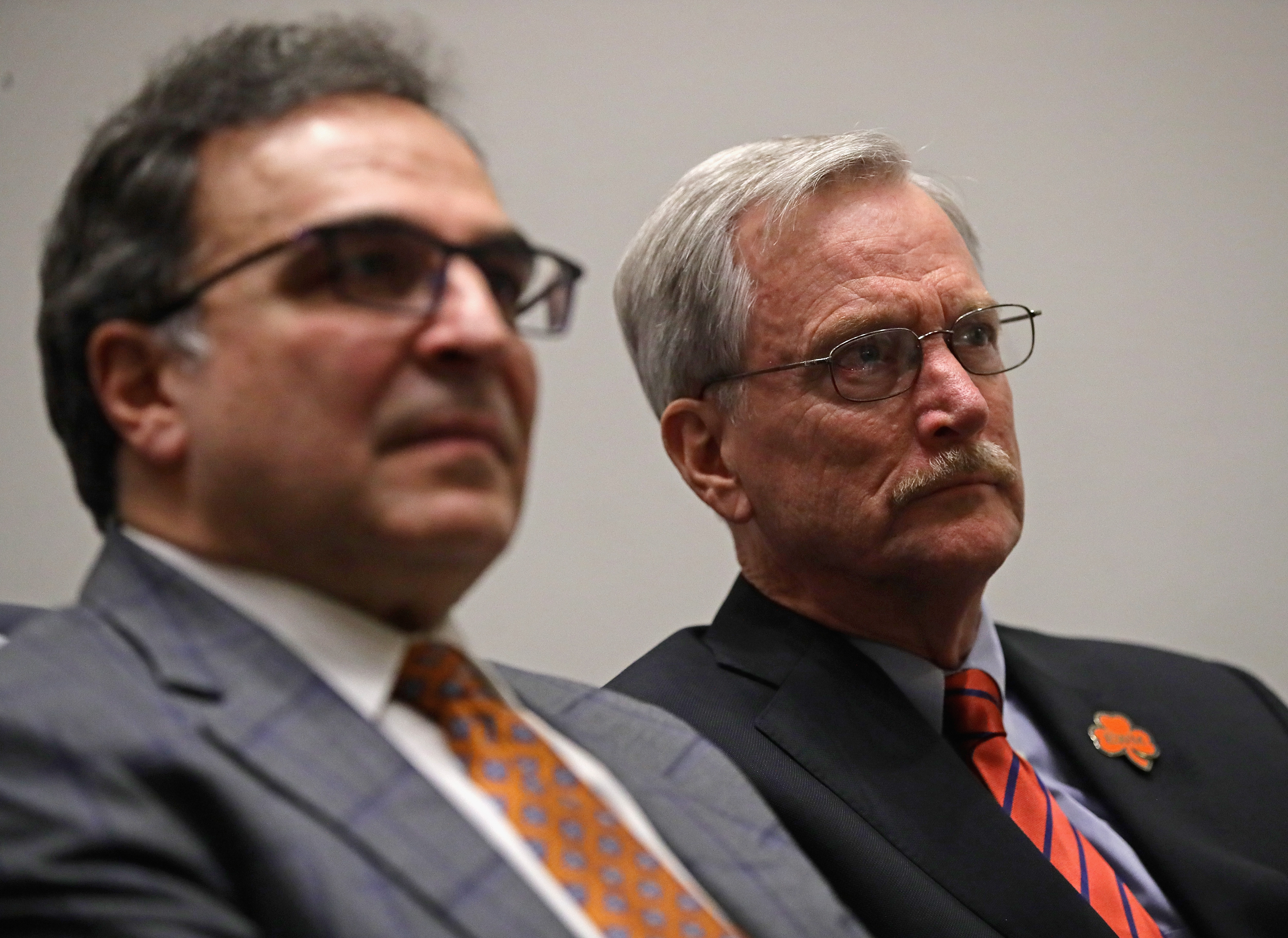 Bears chairman George McCaskey (right) and president and CEO Ted Phillips listen during coach Matt Nagy’s introductory press conference in 2018.