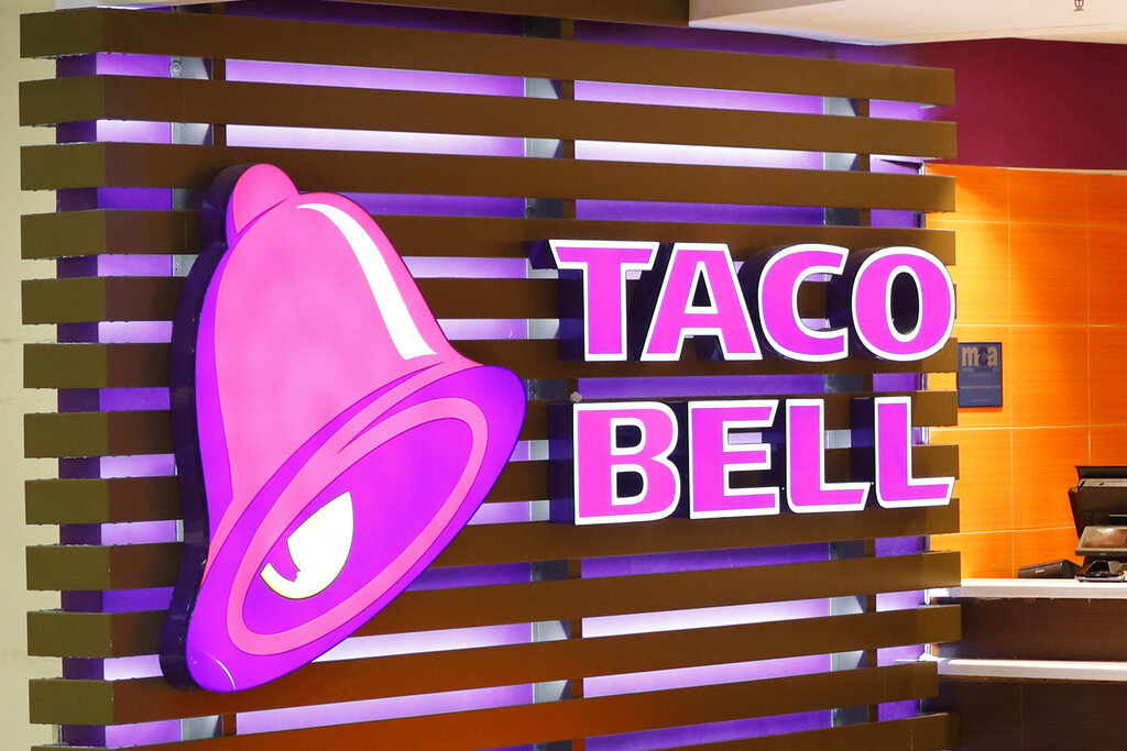 A Taco Bell logo at a restaurant in Miami.