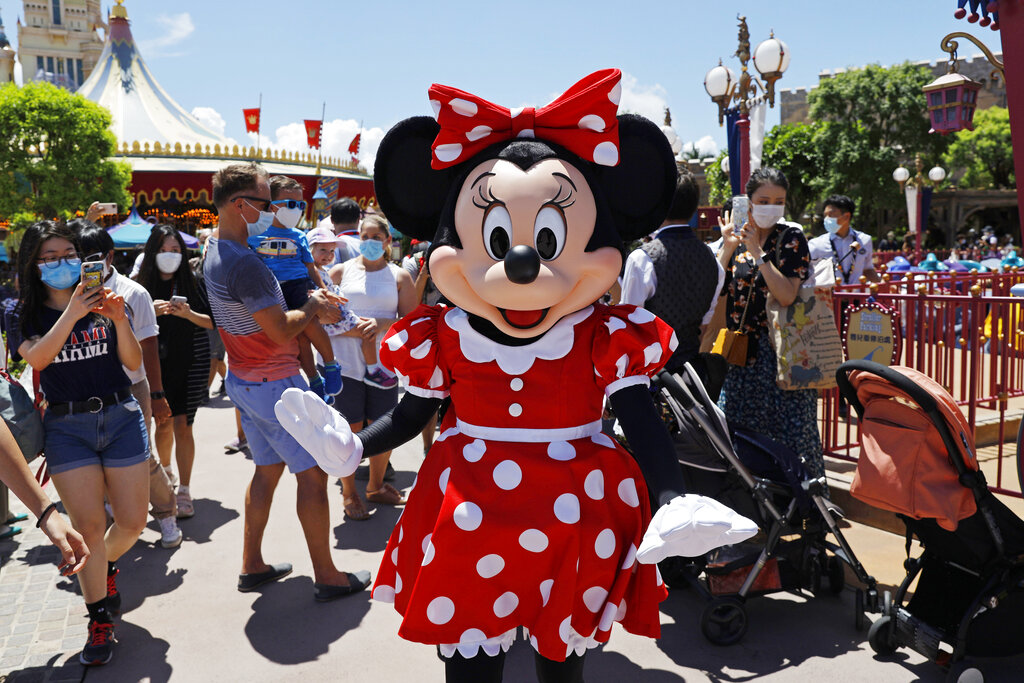 Minnie mouse waving at visitors. 