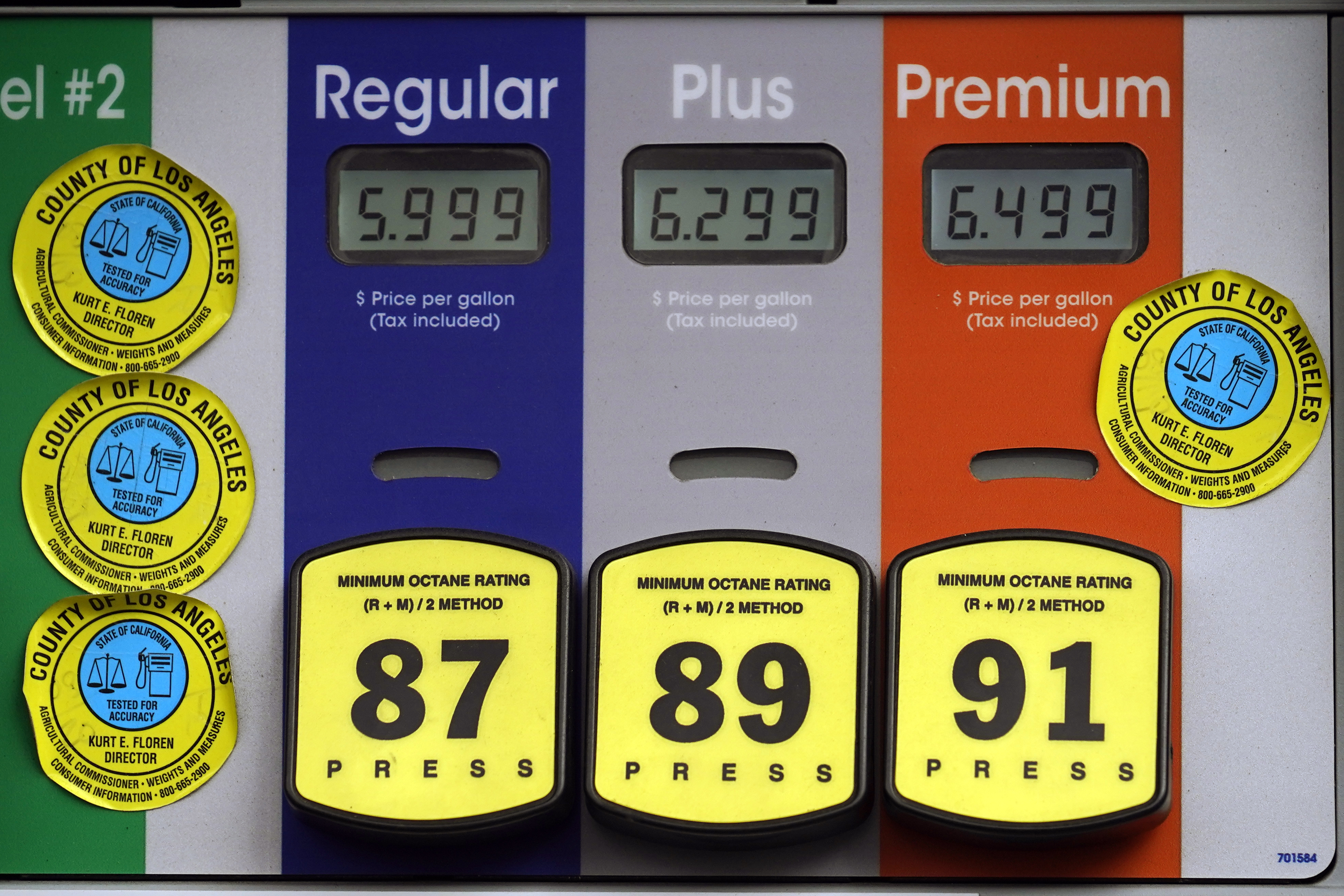 High gas prices are posted at a full service gas station in Beverly Hills, Calif., Nov. 7, 2021.