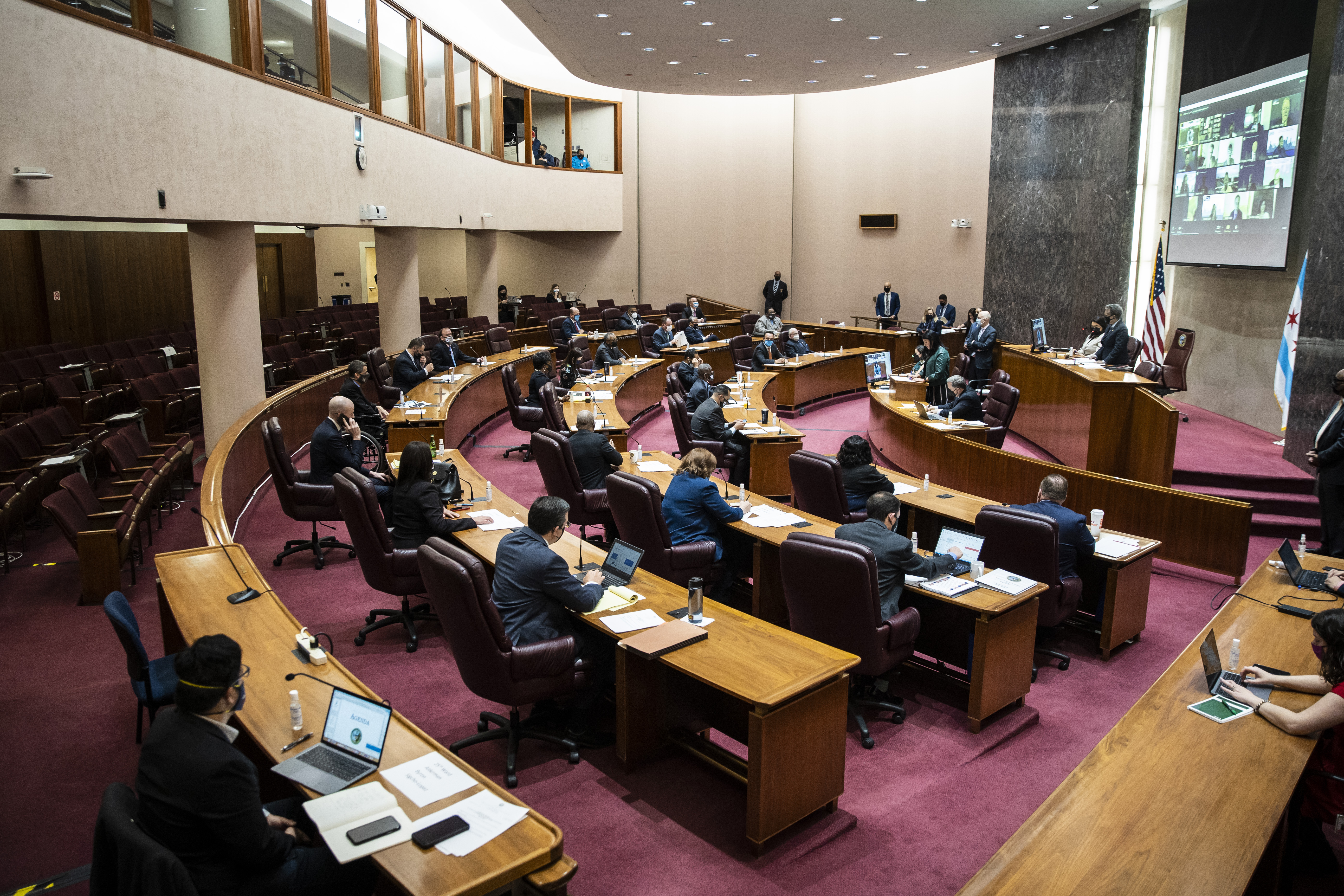 Twenty-eight aldermen attend the Chicago City Council meeting at City Hall in person, while 22 aldermen chose to appear virtually, Wednesday morning, April 21, 2021.