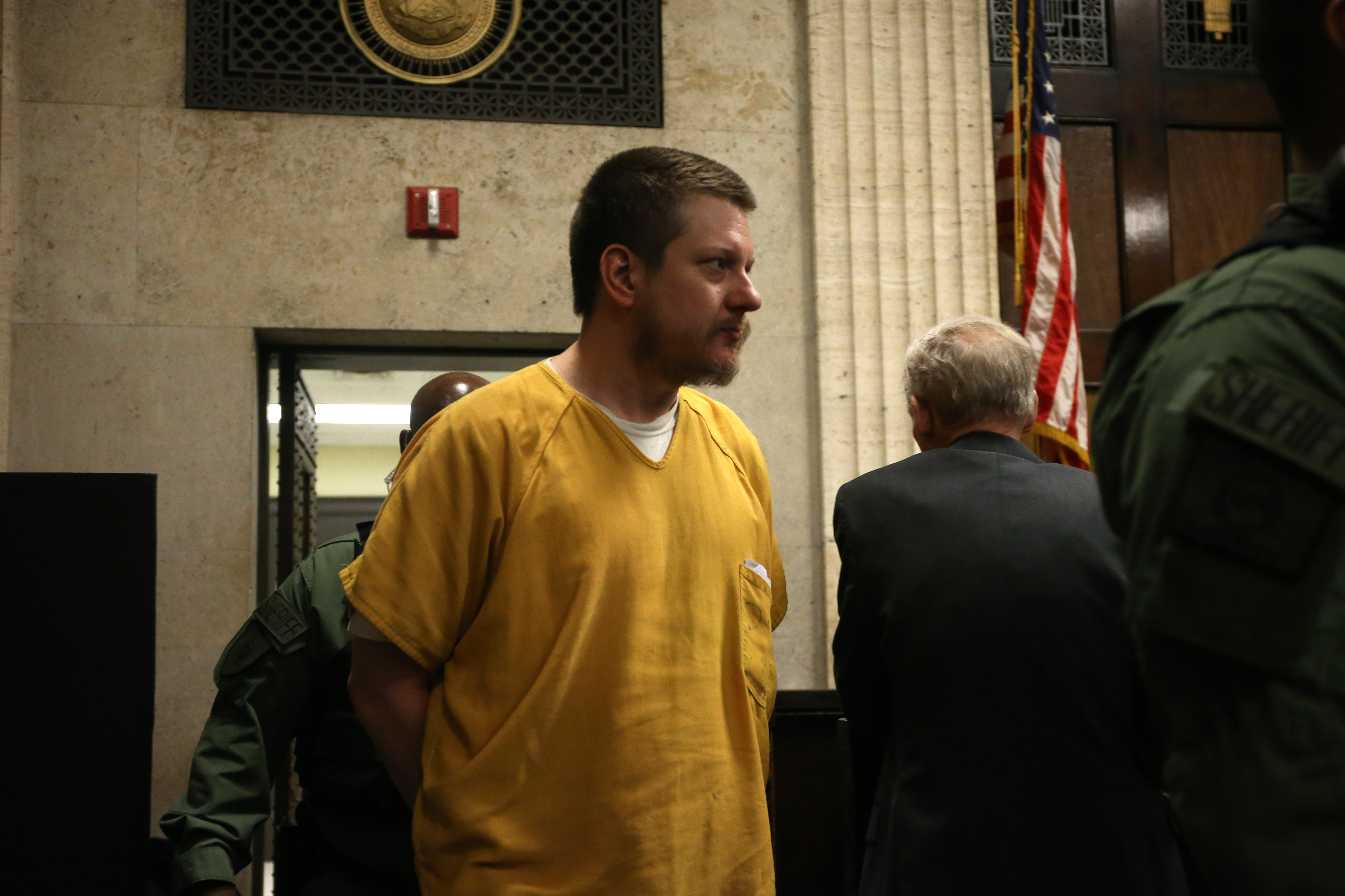 Jason Van Dyke enters the courtroom for his sentencing Jan. 18, 2019.