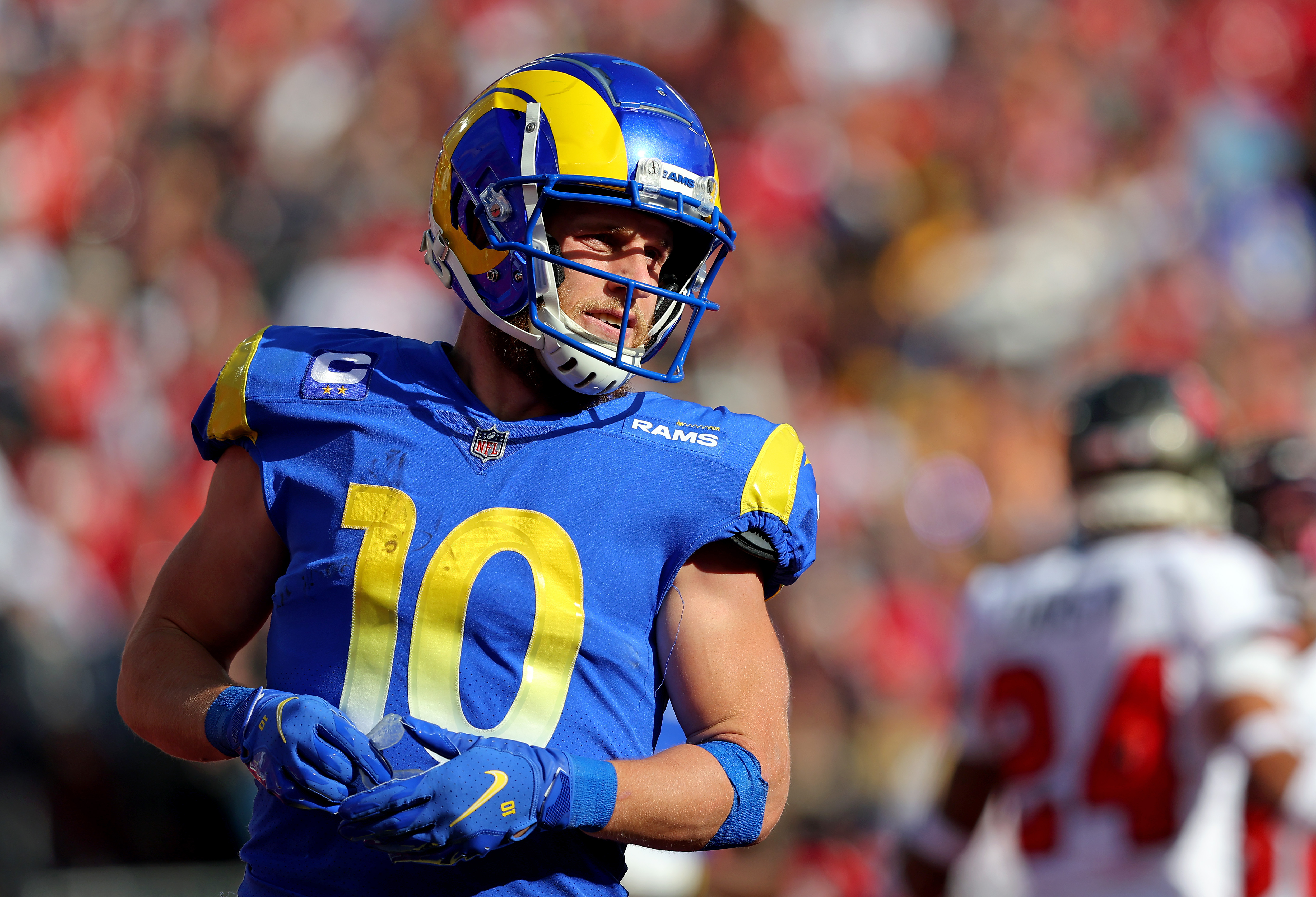 Cooper Kupp #10 of the Los Angeles Rams reacts after scoring a touchdown in the second quarter of the game against the Tampa Bay Buccaneers in the NFC Divisional Playoff game at Raymond James Stadium on January 23, 2022 in Tampa, Florida.