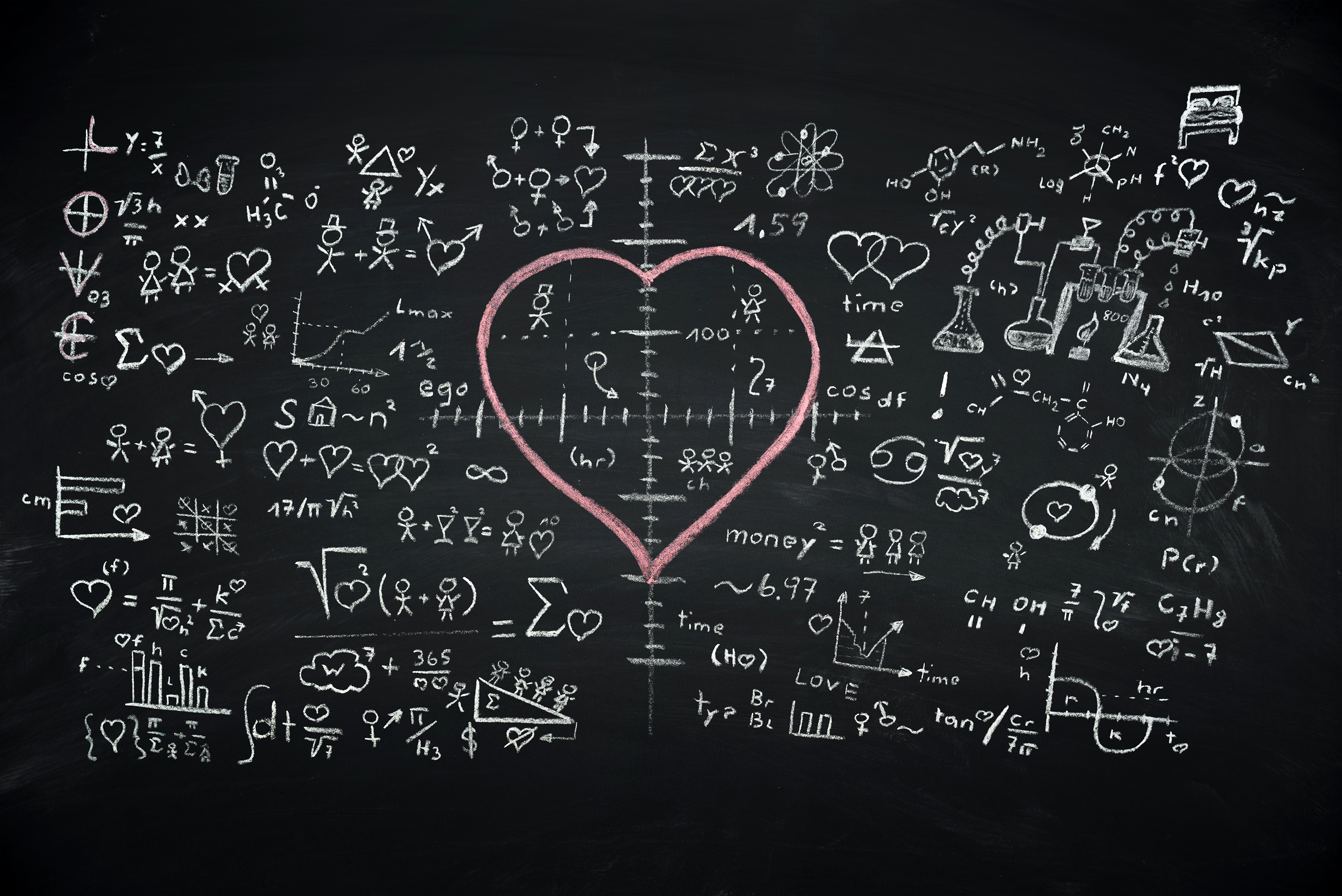 An illustration of a chalkboard covered in formulas with a valentine heart superimposed in the middle.