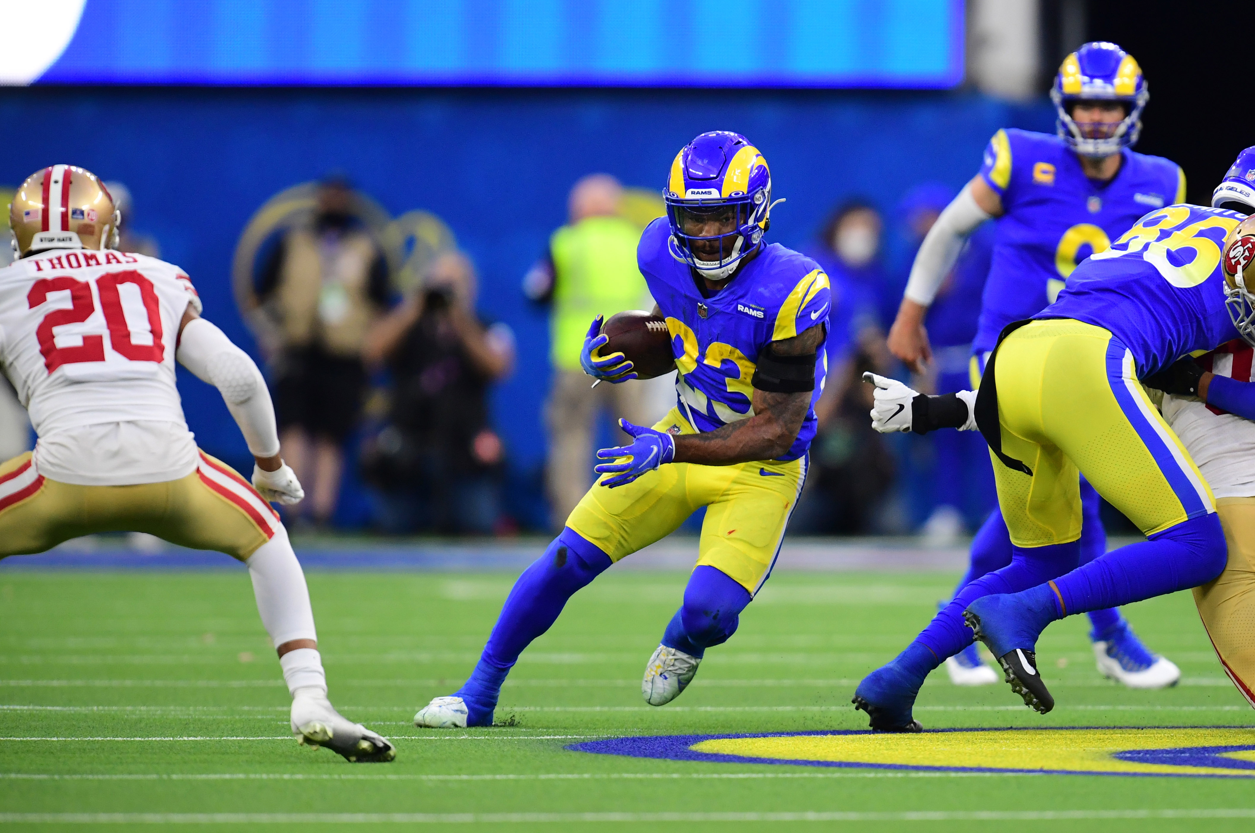 Los Angeles Rams running back Cam Akers (23) runs the ball against the San Francisco 49ers in the first half during the NFC Championship Game at SoFi Stadium.