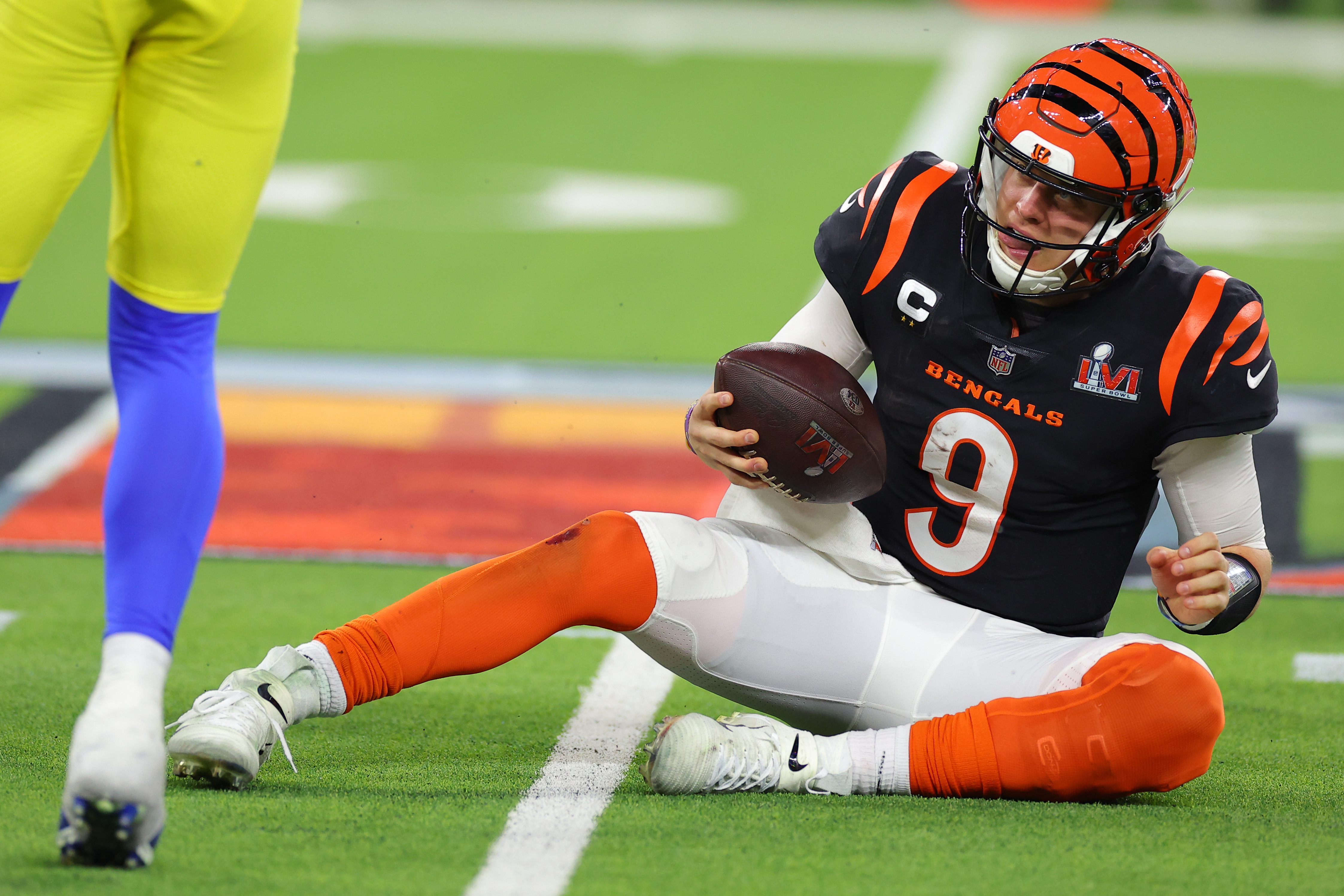 Joe Burrow #9 of the Cincinnati Bengals reacts in the fourth quarter during Super Bowl LVI against the Los Angeles Rams at SoFi Stadium on February 13, 2022 in Inglewood, California.