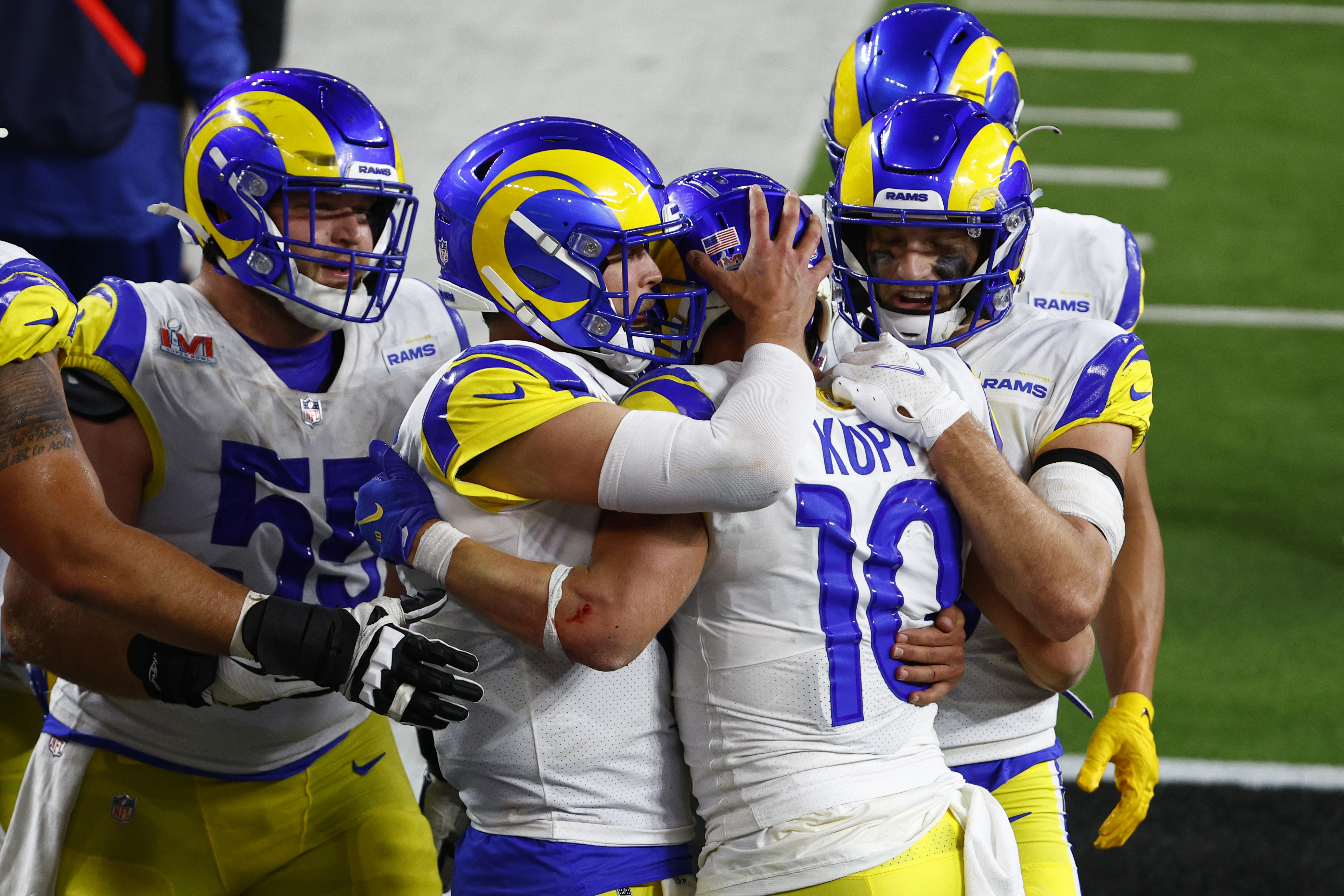 Cooper Kupp #10 of the Los Angeles Rams reacts with Matthew Stafford #9 following a touchdown reception during the fourth quarter of Super Bowl LVI against the Cincinnati Bengals at SoFi Stadium on February 13, 2022 in Inglewood, California.