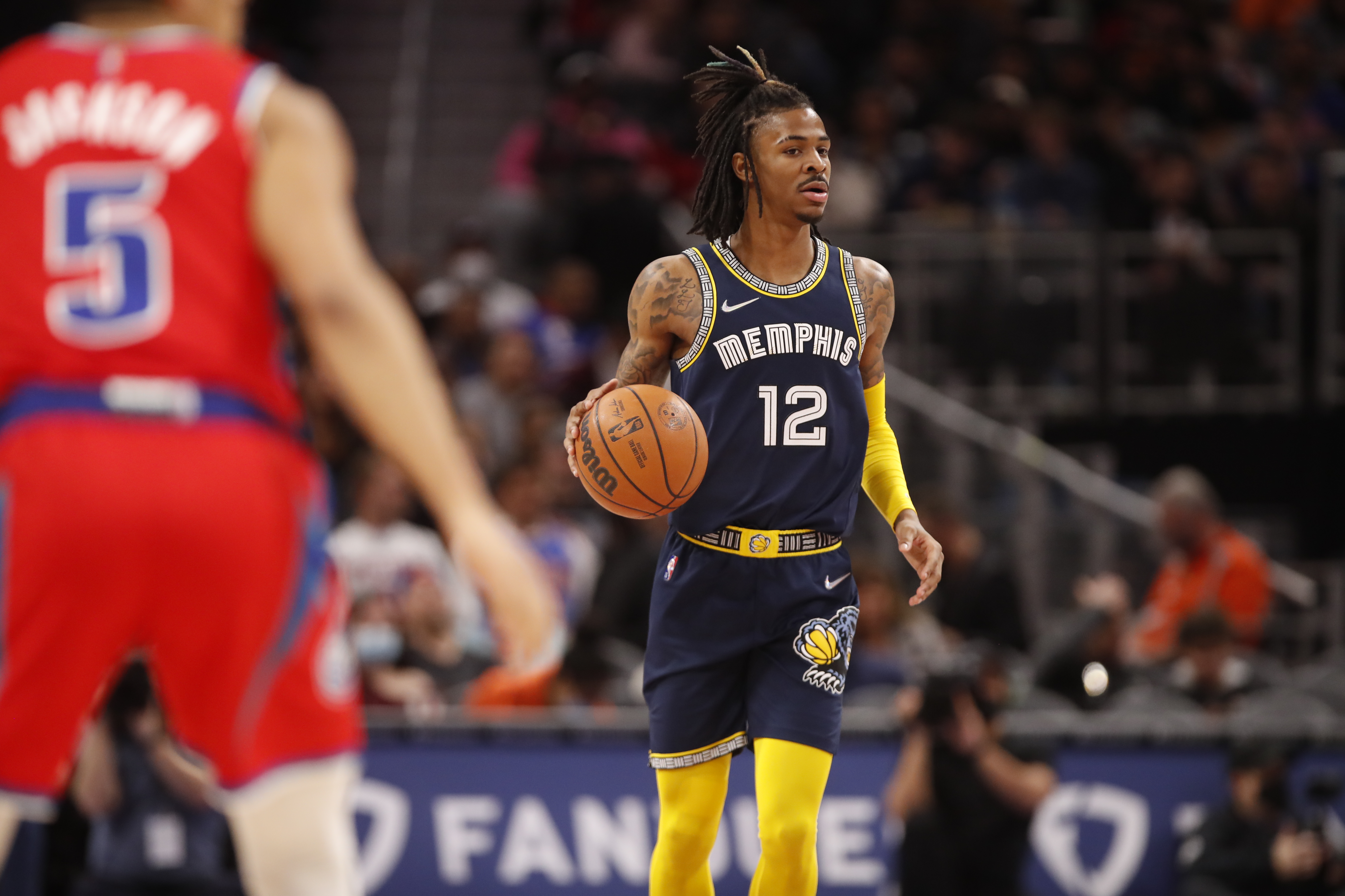 Ja Morant #12 of the Memphis Grizzlies handles the ball during the game against the Detroit Pistons on February 10, 2022 at Little Caesars Arena in Detroit, Michigan.&nbsp;