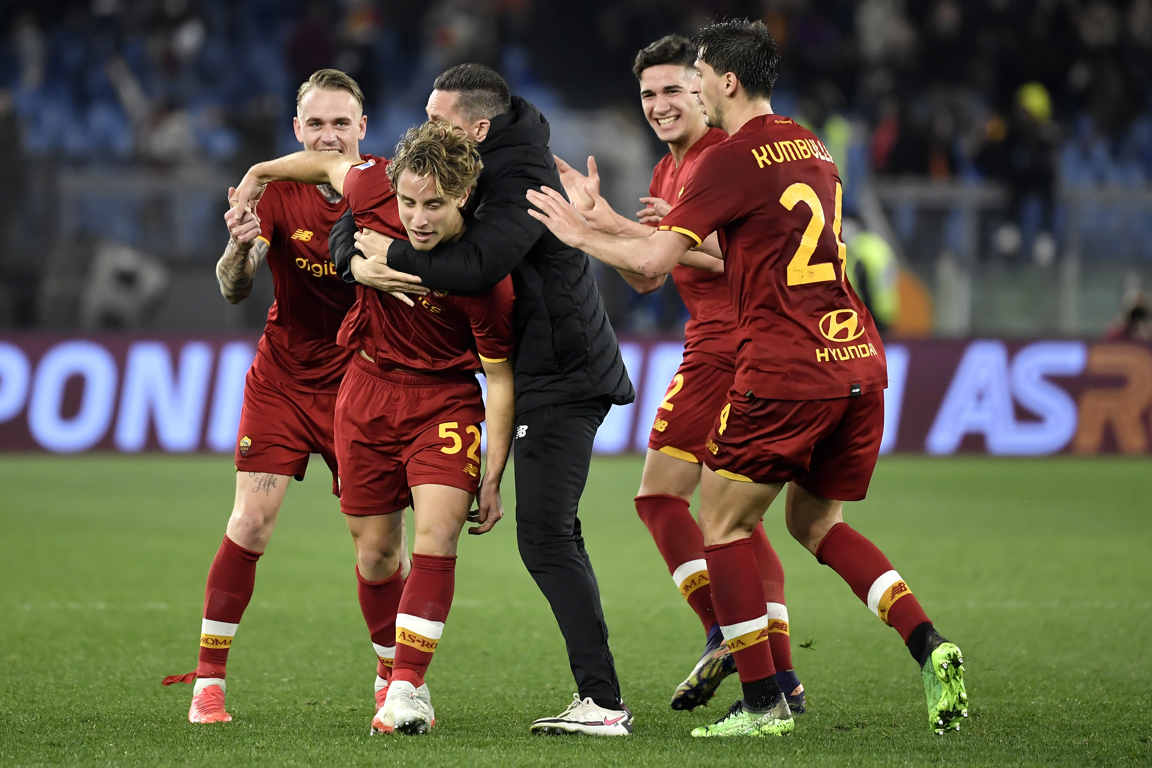 Edoardo Bove of AS Roma celebrates with teammates Rick...