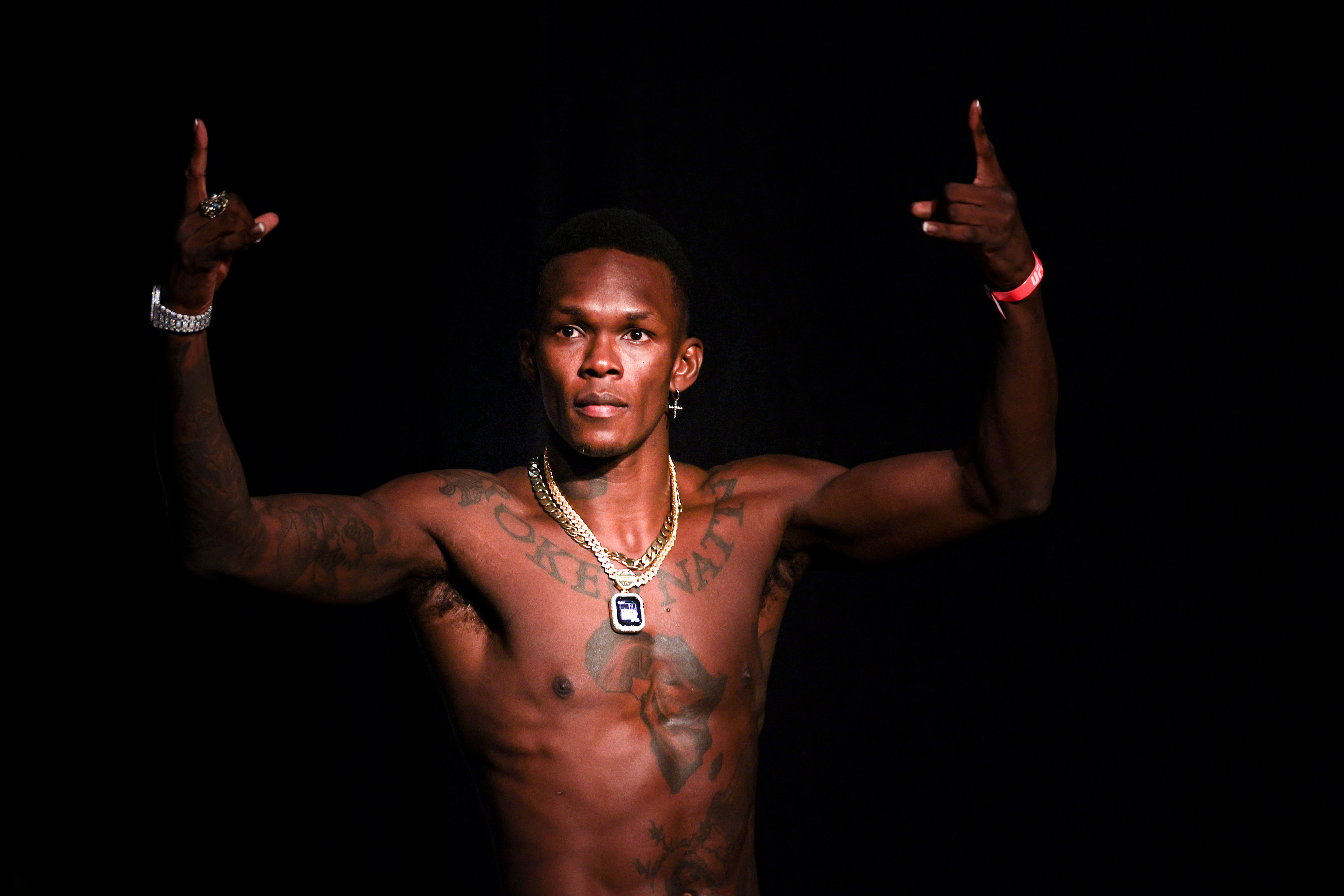 Middleweight champion Israel Adesanya weighs in for UFC 271. 