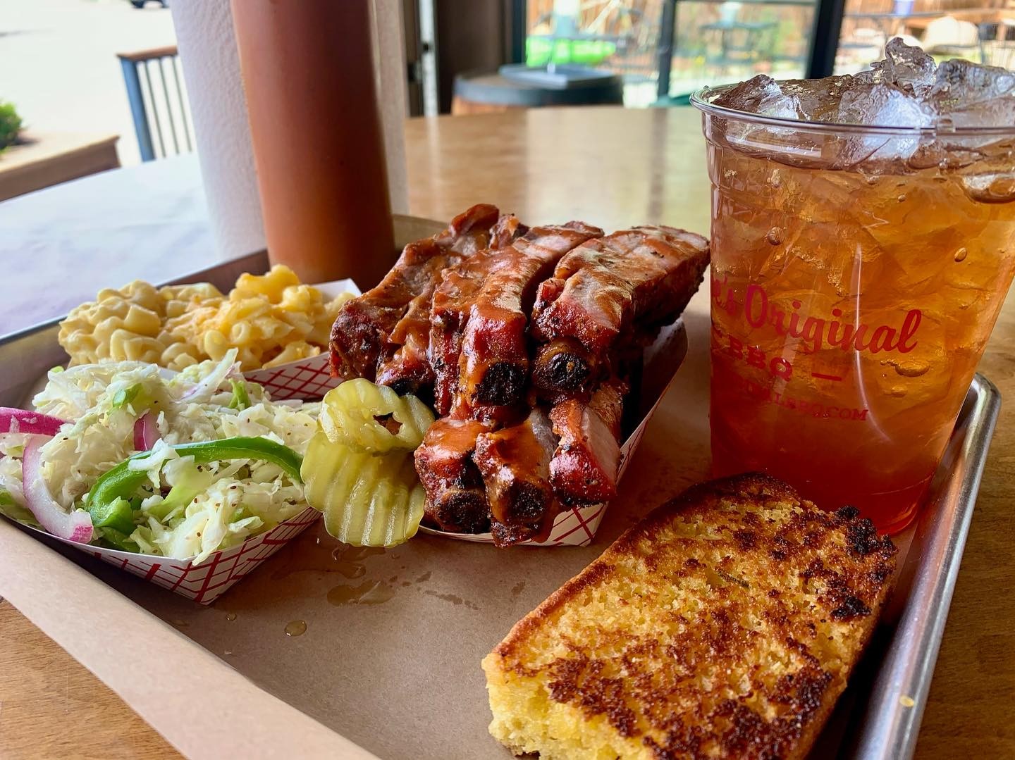 Coleslaw, mac and cheese, Texas toast, a slab of barbecue ribs and an ice cold sweet tea from Moe’s Original BBQ. 