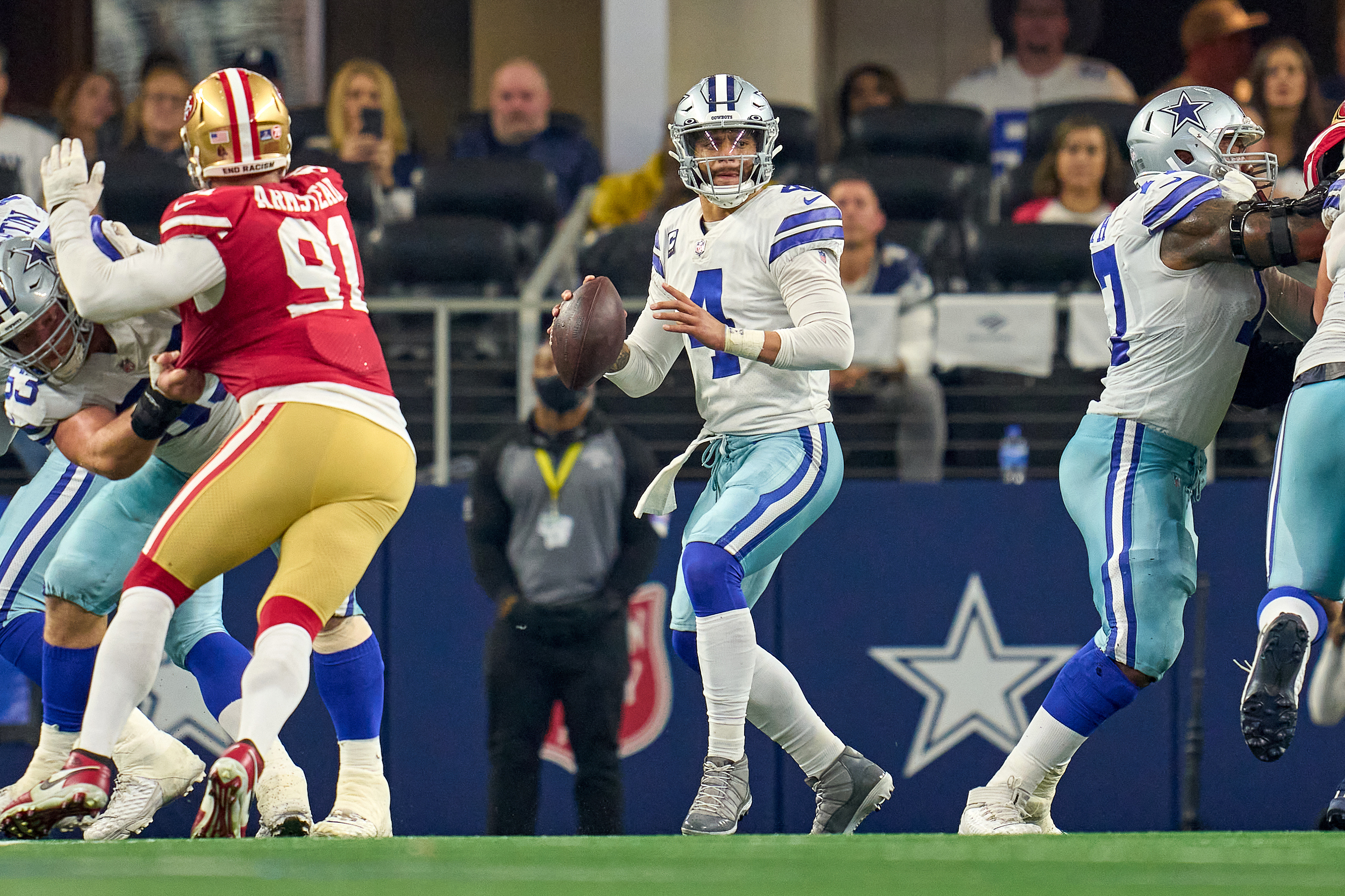 Dallas Cowboys quarterback Dak Prescott (4) looks to throw the football during the NFC Wild Card game between the San Francisco 49ers and the Dallas Cowboys on January 16, 2022 at AT&amp;T Stadium in Arlington, TX.