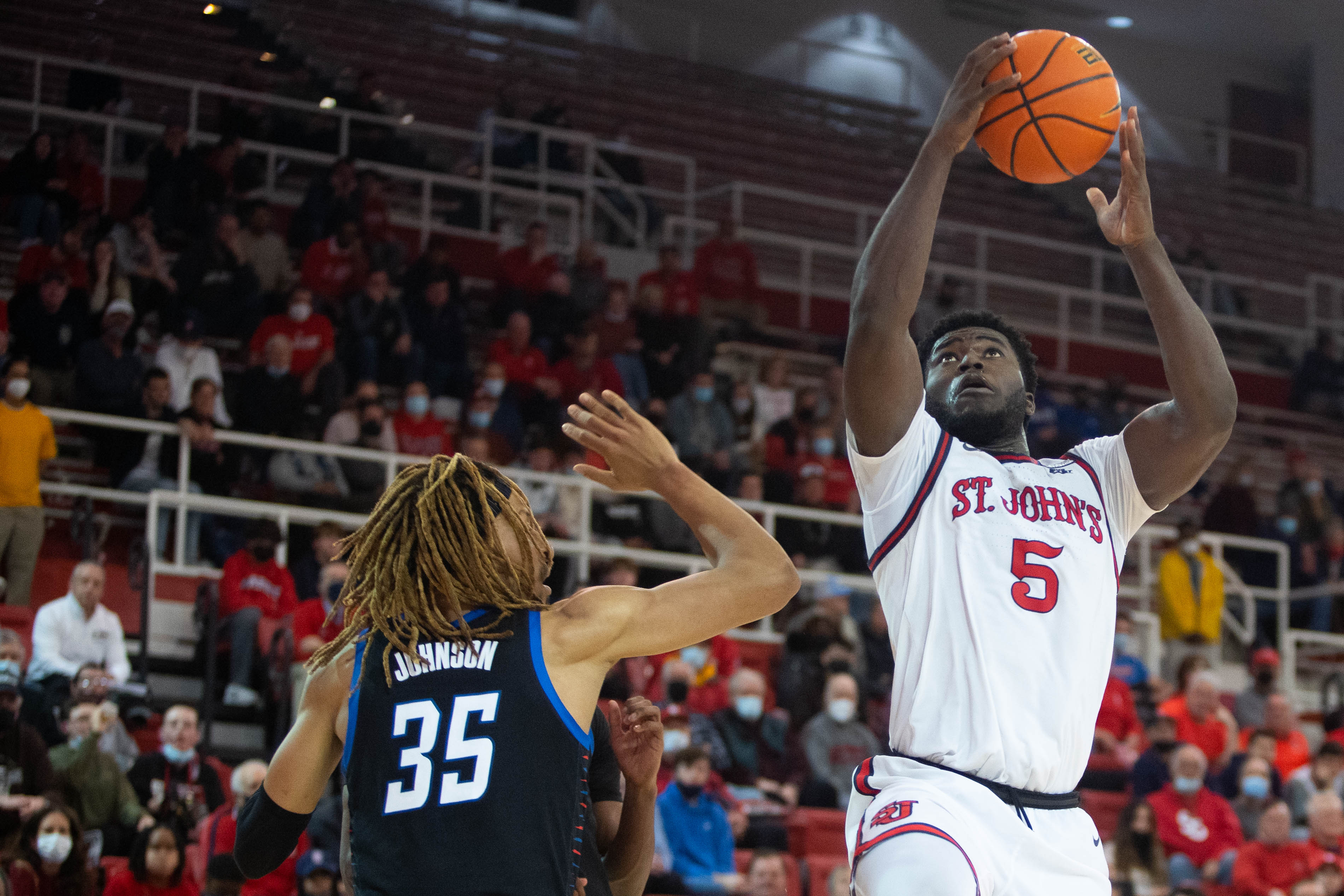 St. John's comes off of a two-and-a-half week pause because of COVID positives to knock off DePaul in the Red Storm's Big East opener, 89-84.