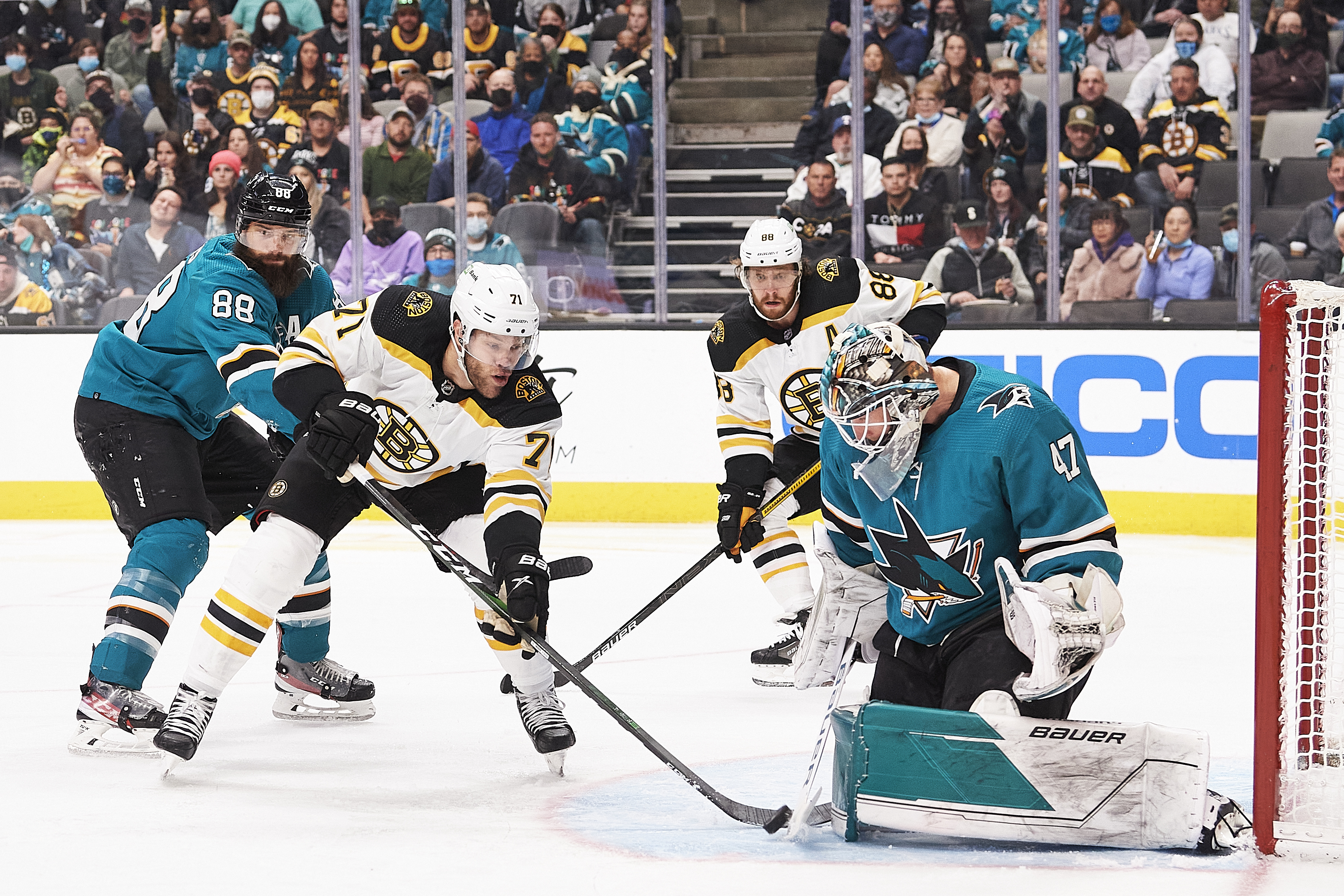 San Jose Sharks goaltender James Reimer (47) makes a save on Boston Bruins left wing Taylor Hall (71) during the NHL game between the San Jose Sharks and the Boston Bruins on February 26, 2022 at SAP Center in San Jose, CA.