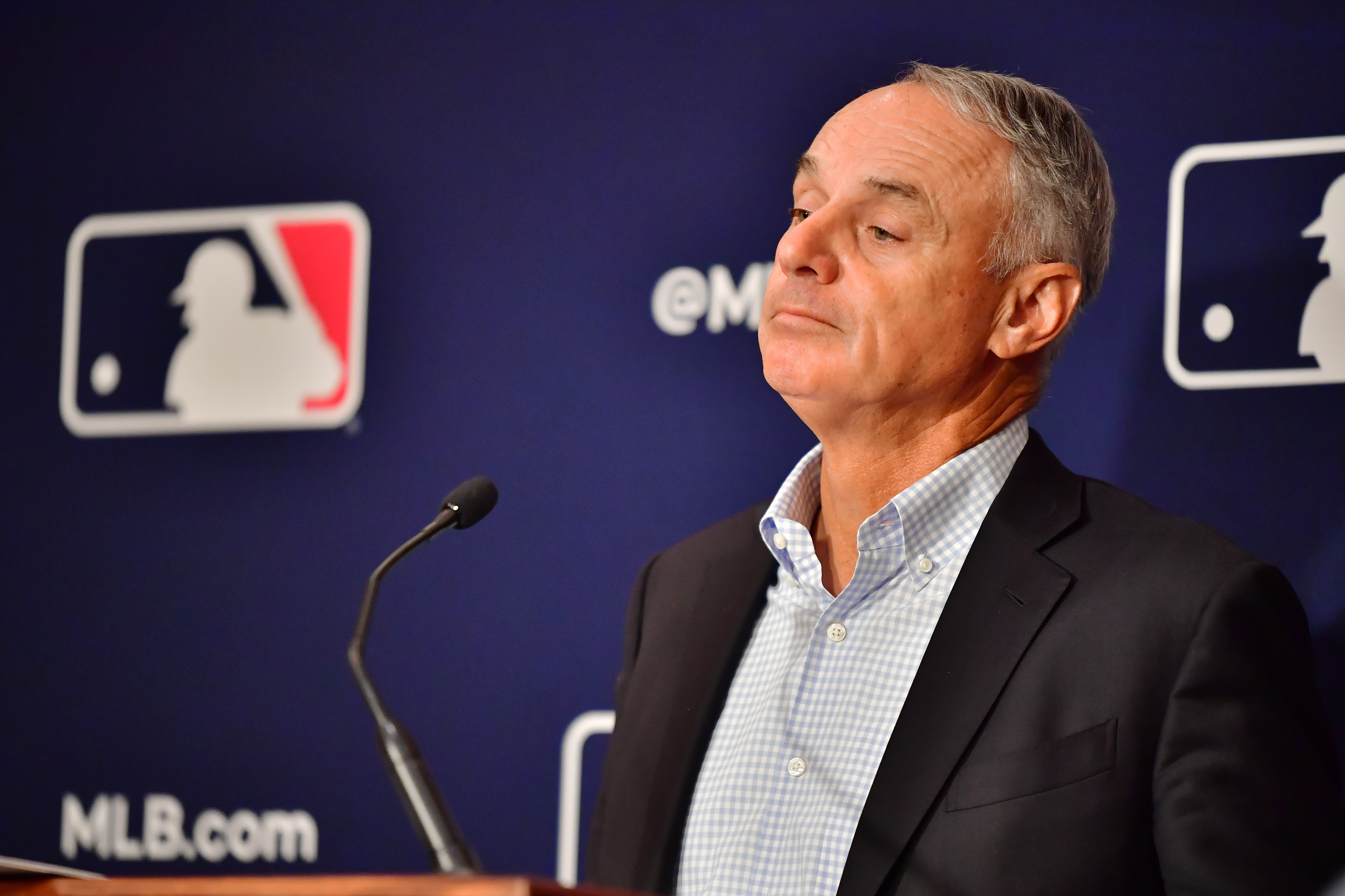 Major League Baseball Commissioner Rob Manfred answers questions during an MLB owner’s meeting at the Waldorf Astoria on February 10, 2022 in Orlando, Florida