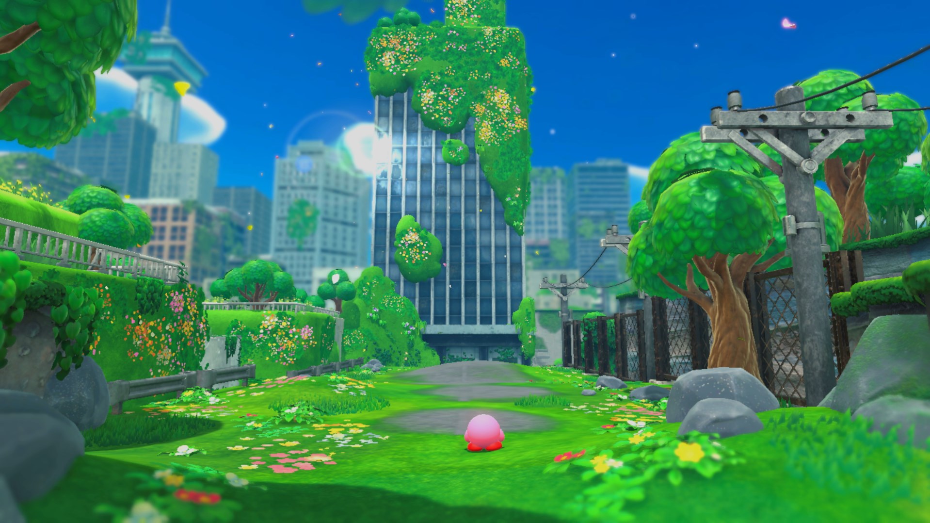 Kirby looks over a vast city with greenery grown over everything