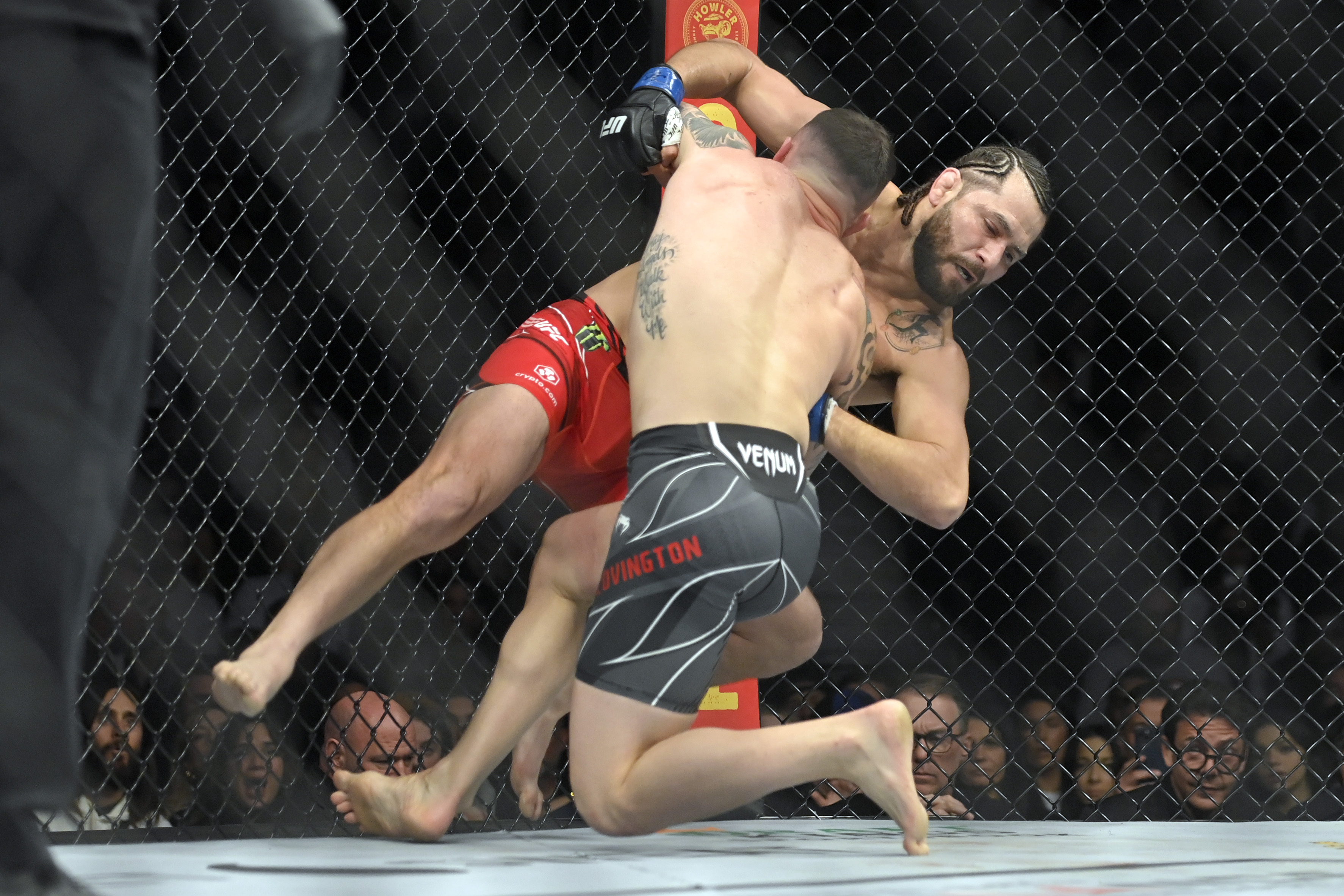 Colby Covington takes down Jorge Masvidal during their UFC 272 headliner fight. 