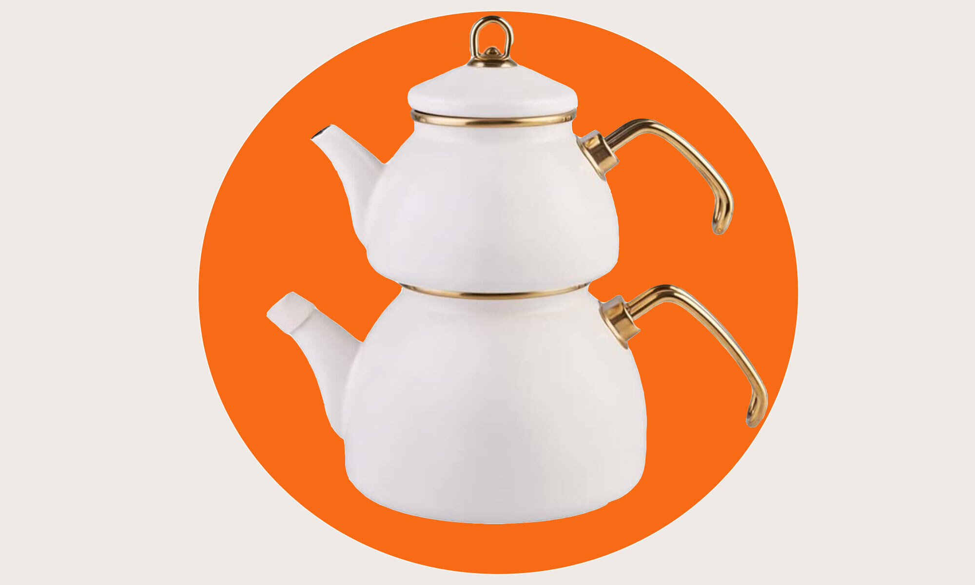 A porcelain double teapot with bronze handles and rims, against an abstract background 