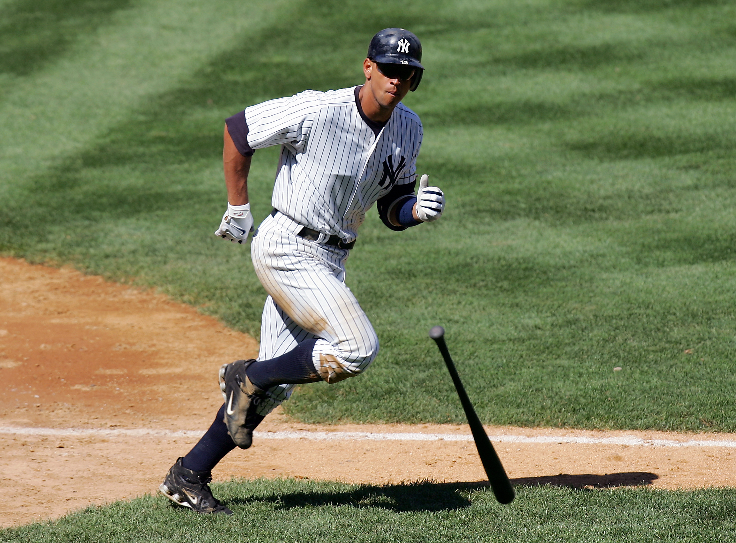 New York Yankees’ Alex Rodriguez tosses his bat as he starts