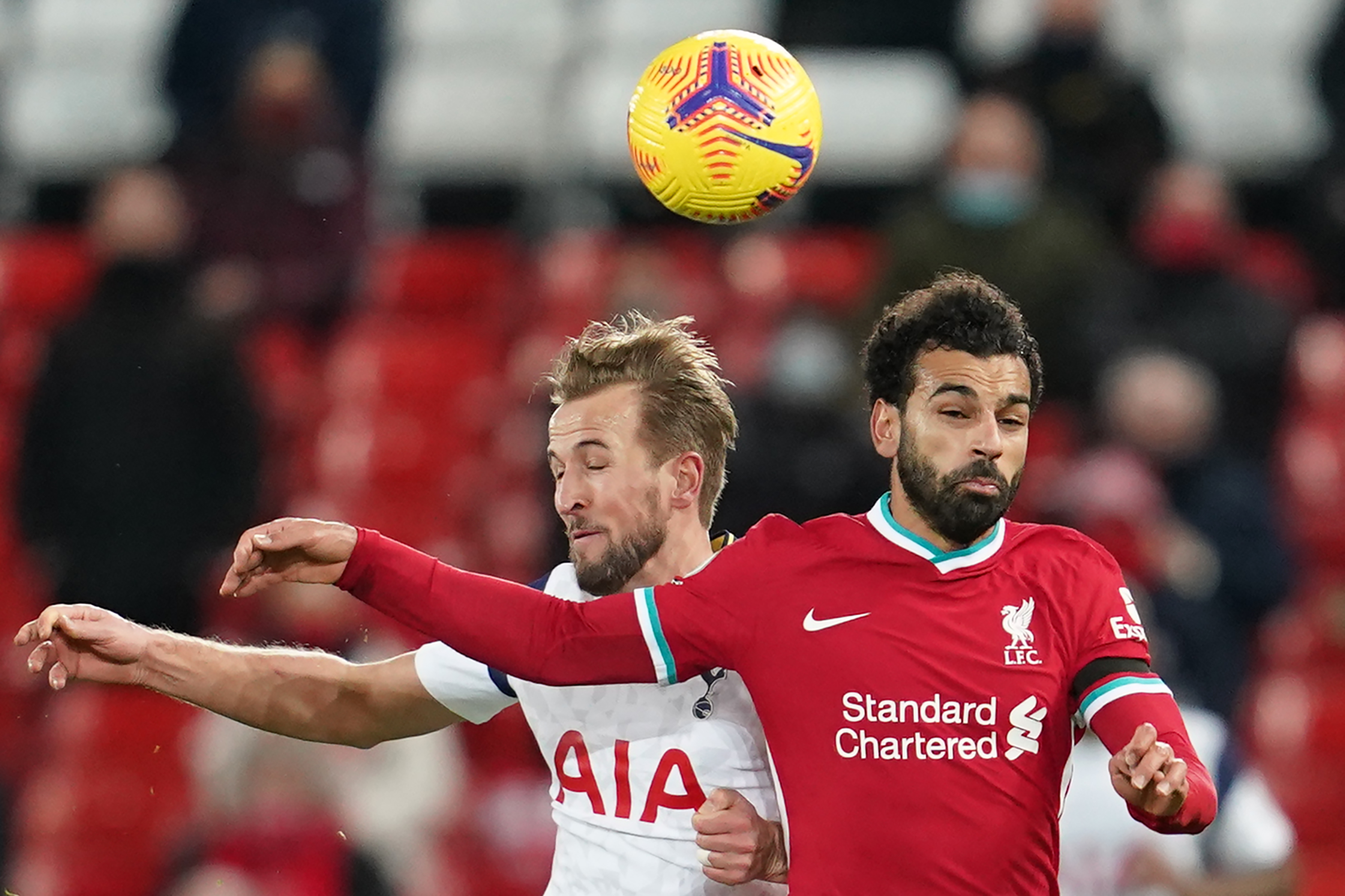 Harry Kane vies with Liverpool’s Egyptian midfielder Mohamed Salah - LIVERPOOL vs TOTTENHAM - Premier League