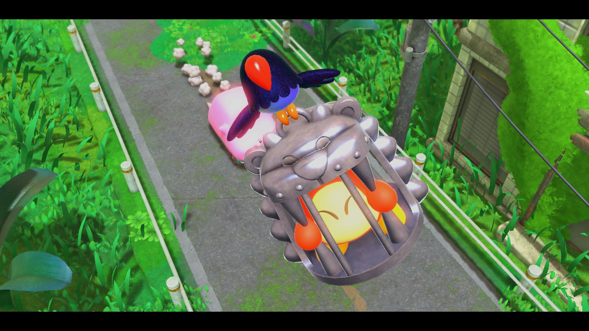 A Waddle Dee in a cage being carried by a crow while Kirby car drives below