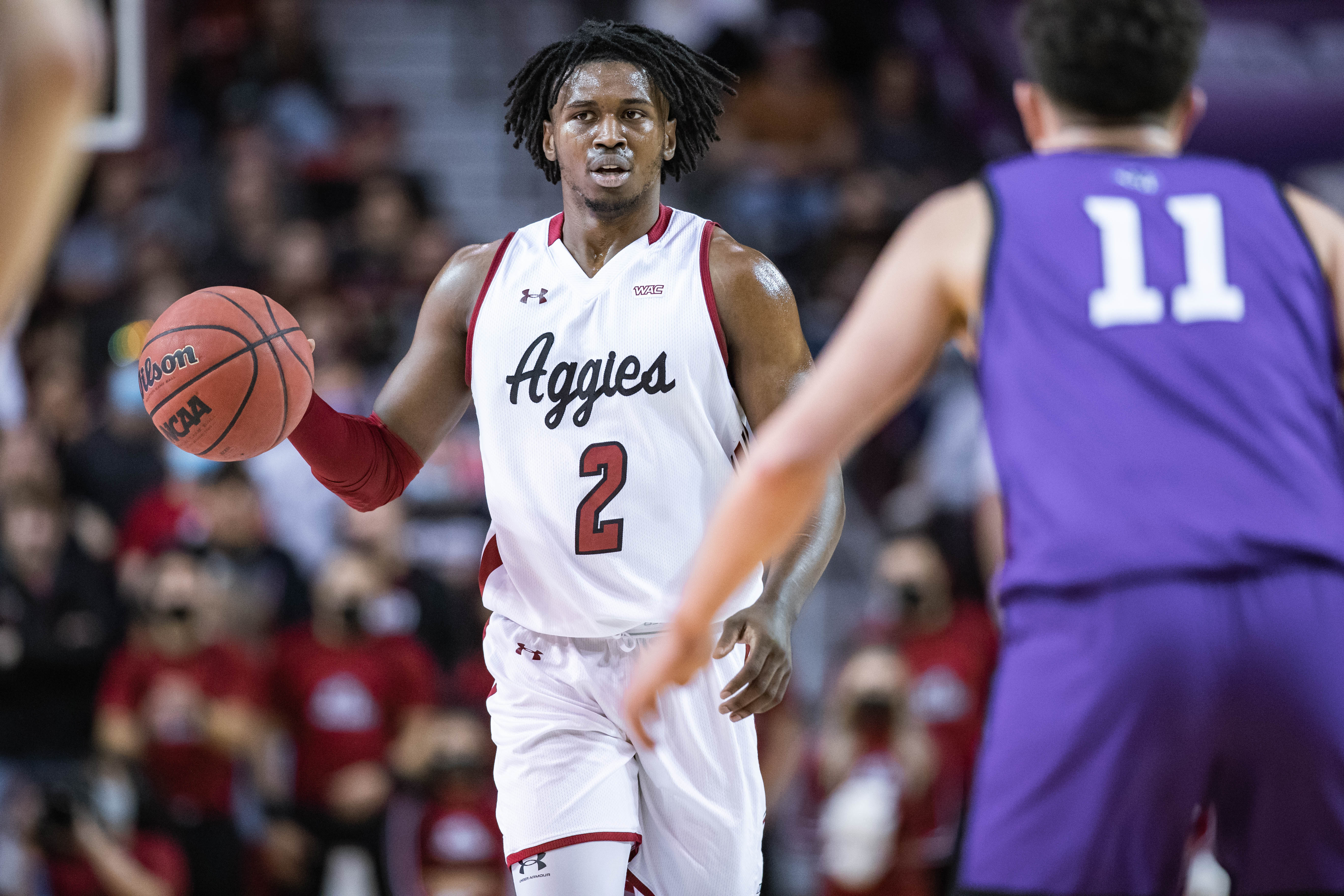 Donnie Tillman works up court as the New Mexico State Aggies face off against the Abilene Christian Wildcats at the Pas American in Las Cruces on Saturday, Jan. 15, 2022.&nbsp;