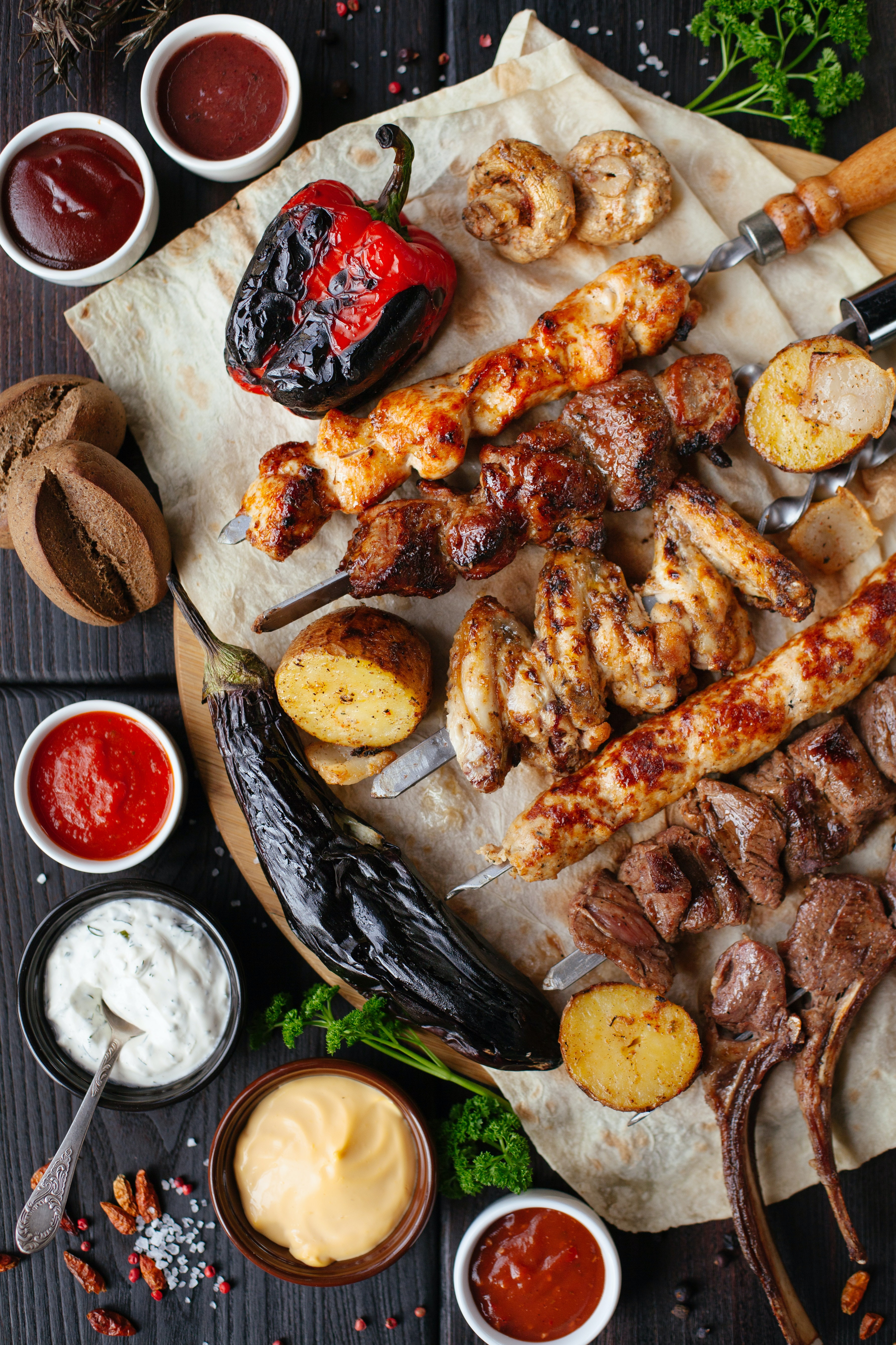 a variety of meats on a gray background.
