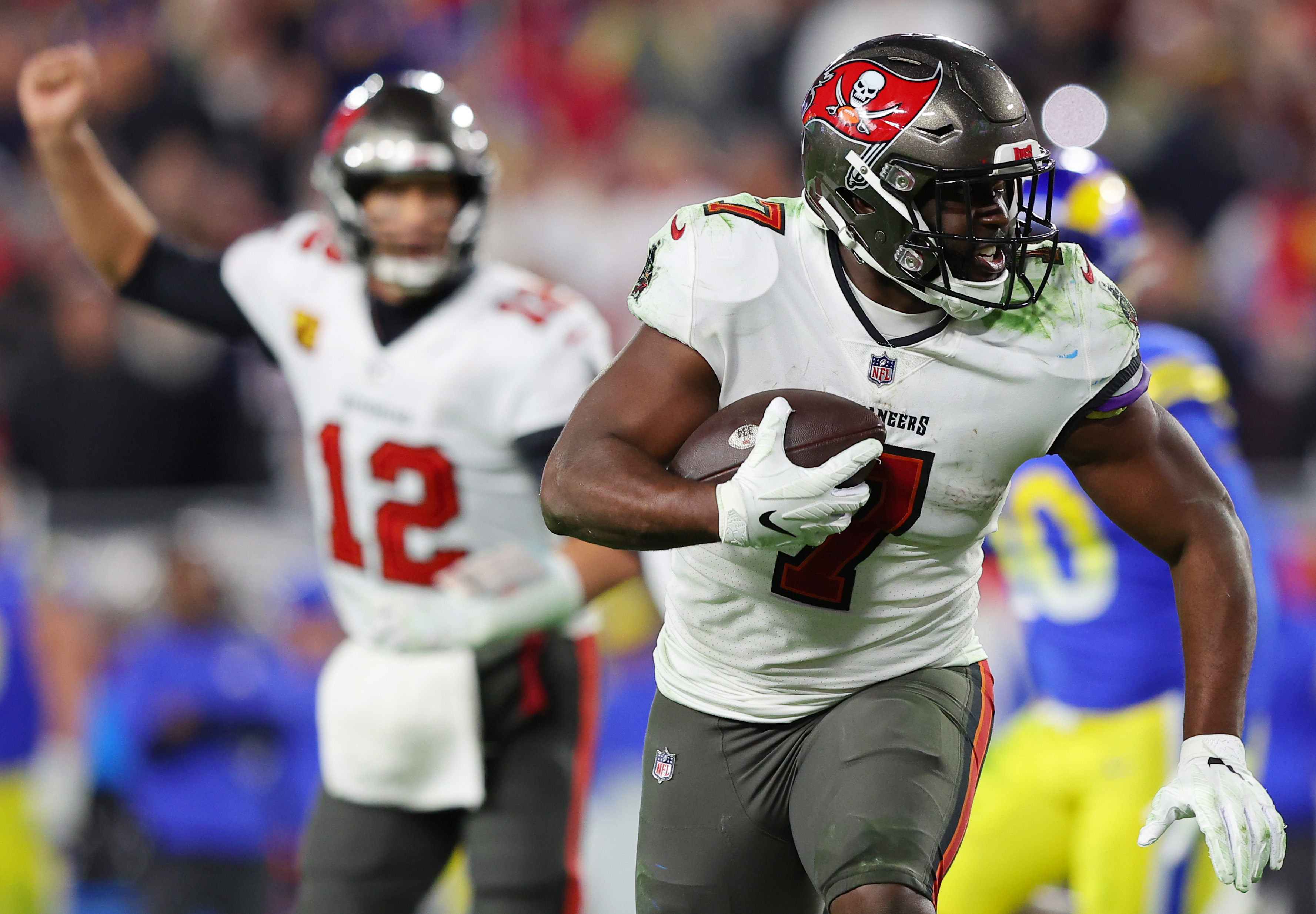 &nbsp;Leonard Fournette #7 of the Tampa Bay Buccaneers runs for a touchdown in the fourth quarter against the Los Angeles Rams in the NFC Divisional Playoff game at Raymond James Stadium on January 23, 2022 in Tampa, Florida.