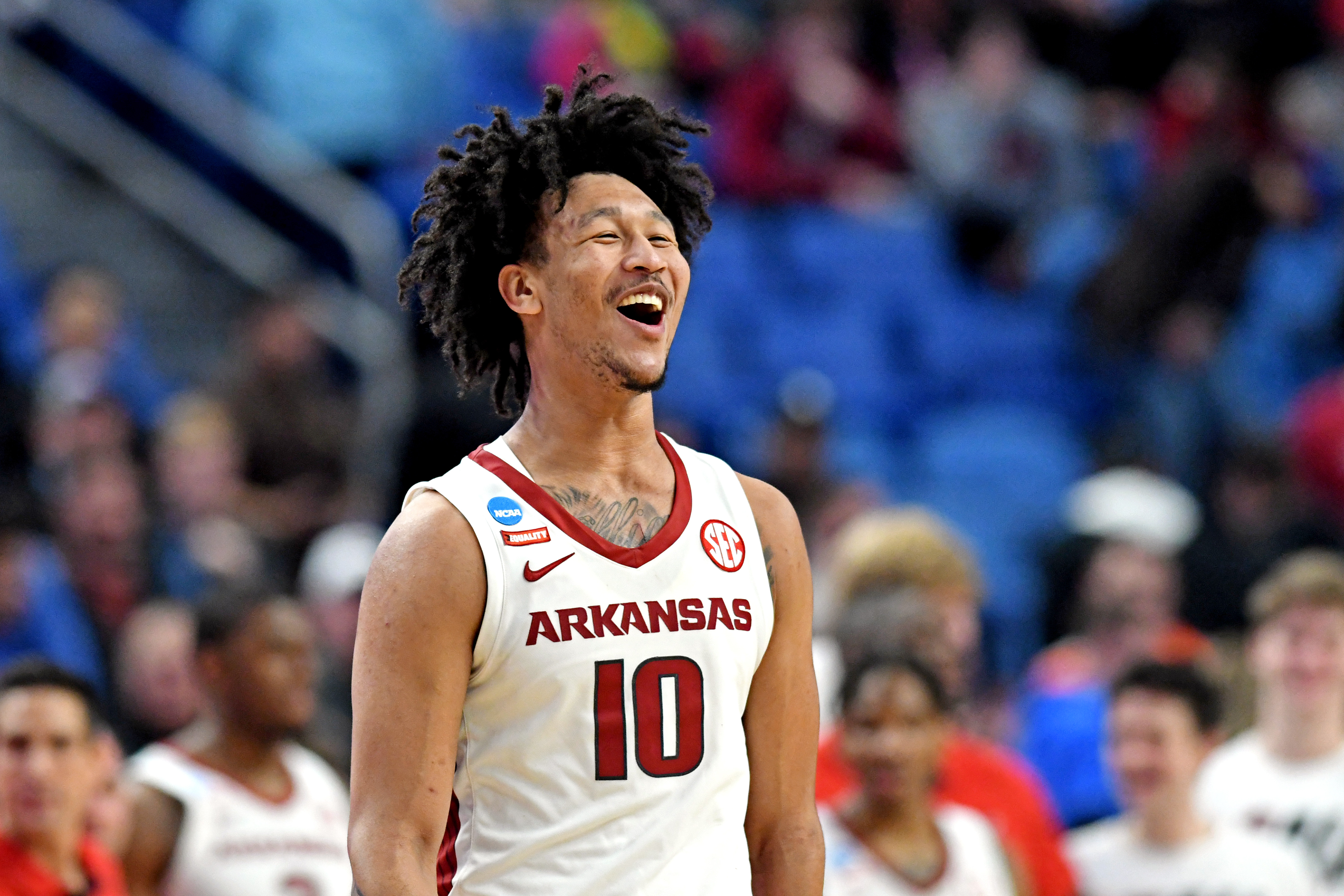 Arkansas Razorbacks forward Jaylin Williams celebrates during the second half against the New Mexico State Aggies during the second round of the 2022 NCAA Tournament at KeyBank Center.