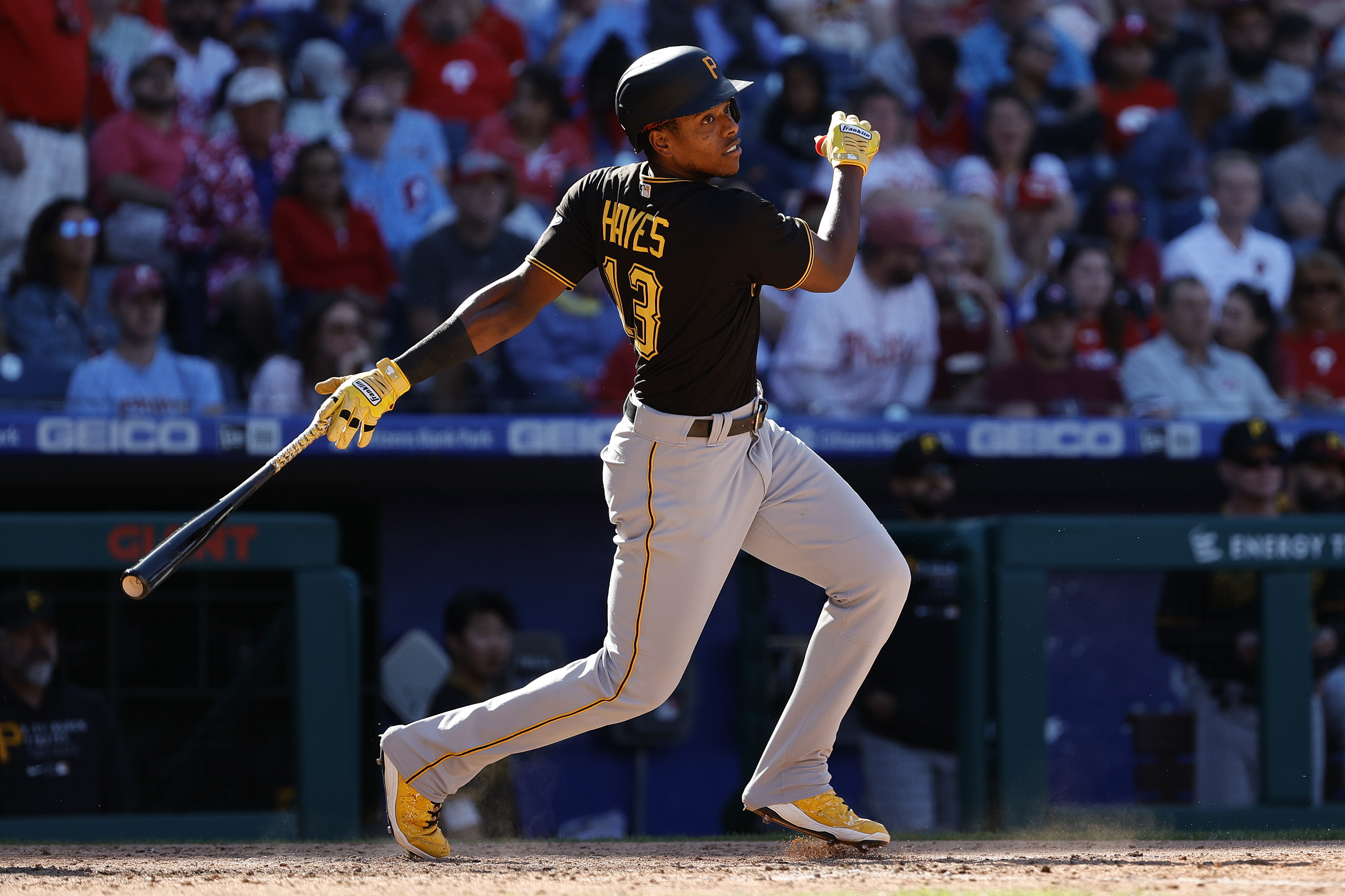 Ke’Bryan Hayes #13 of the Pittsburgh Pirates hits a two-RBI triple during the seventh inning against the Philadelphia Phillies at Citizens Bank Park on September 26, 2021 in Philadelphia, Pennsylvania.