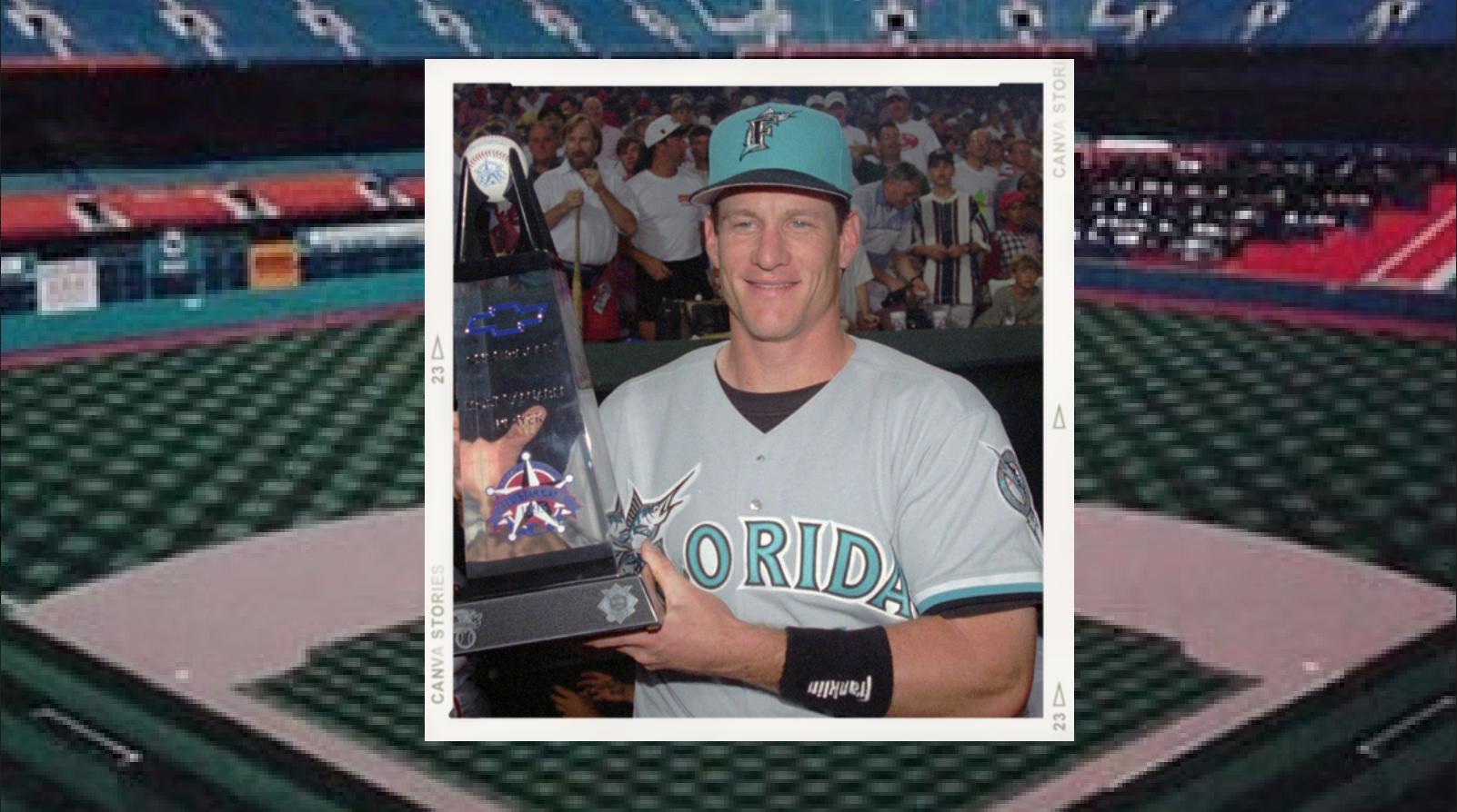 Jeff Conine holds his 1995 MLB All-Star Game MVP trophy