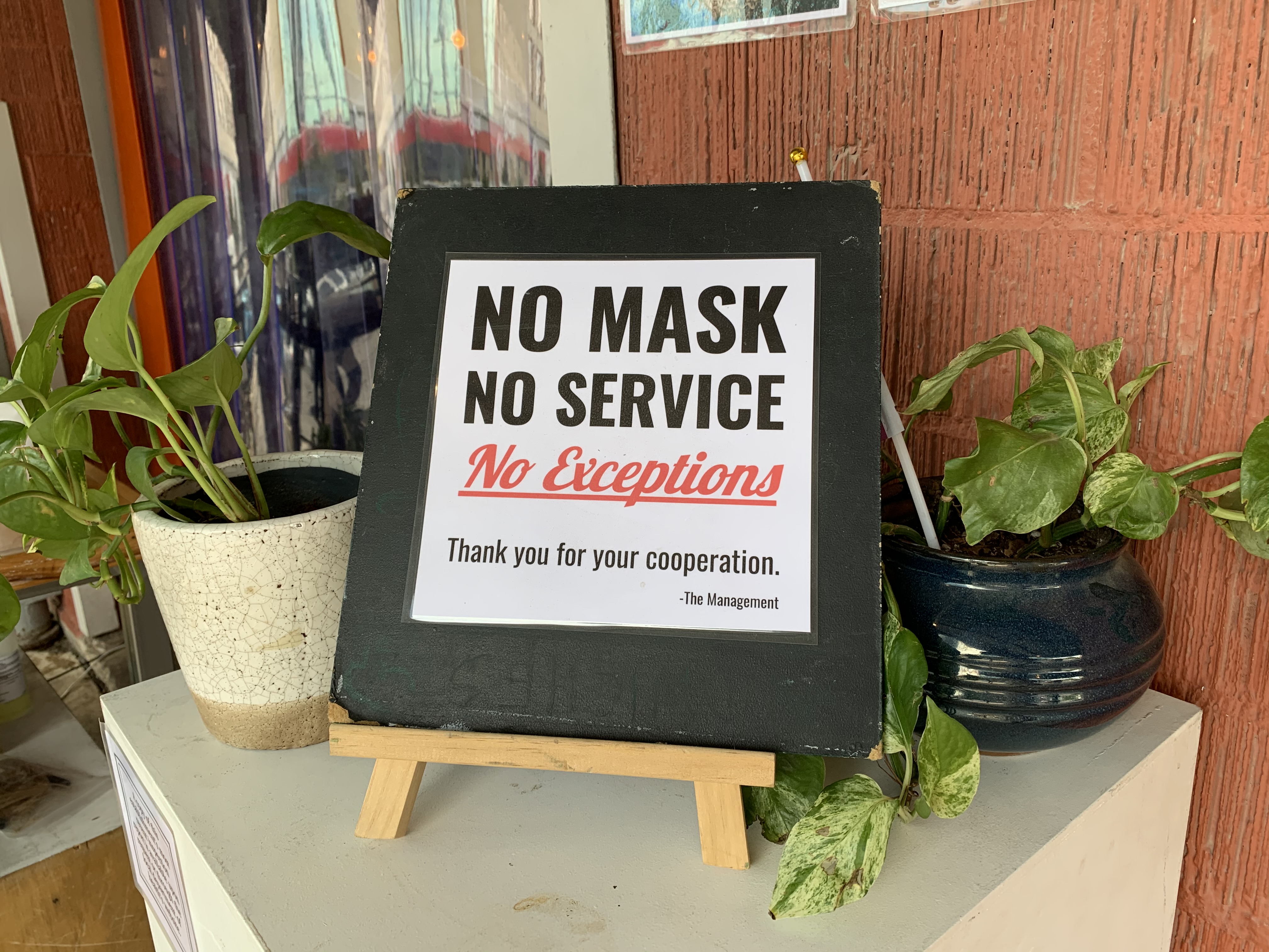 The mask signage at Brew &amp; Brew