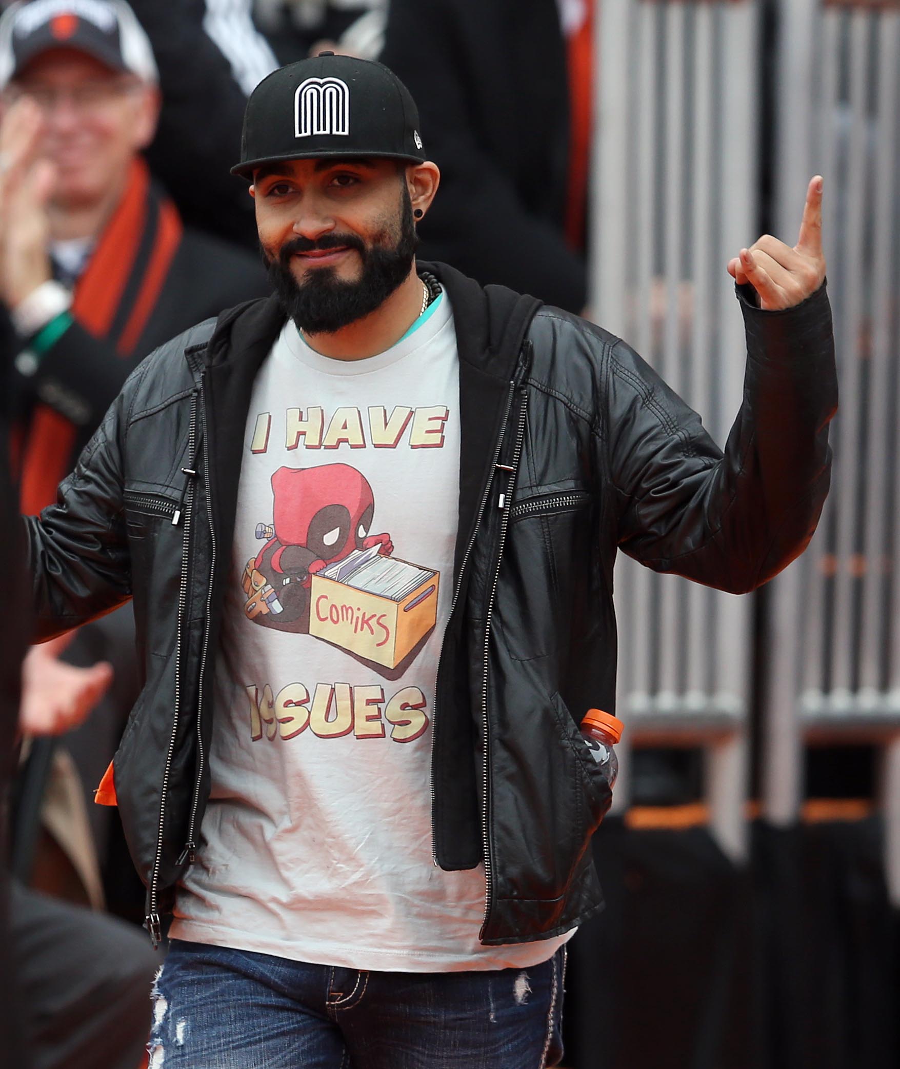 San Francisco Giants pitcher Sergio Romo acknowledges the crowd as they celebrate their World Series championship at Civic Center Plaza in San Francisco, Calif., on Friday, October 31, 2014. (Jane Tyska/Bay Area News Group)