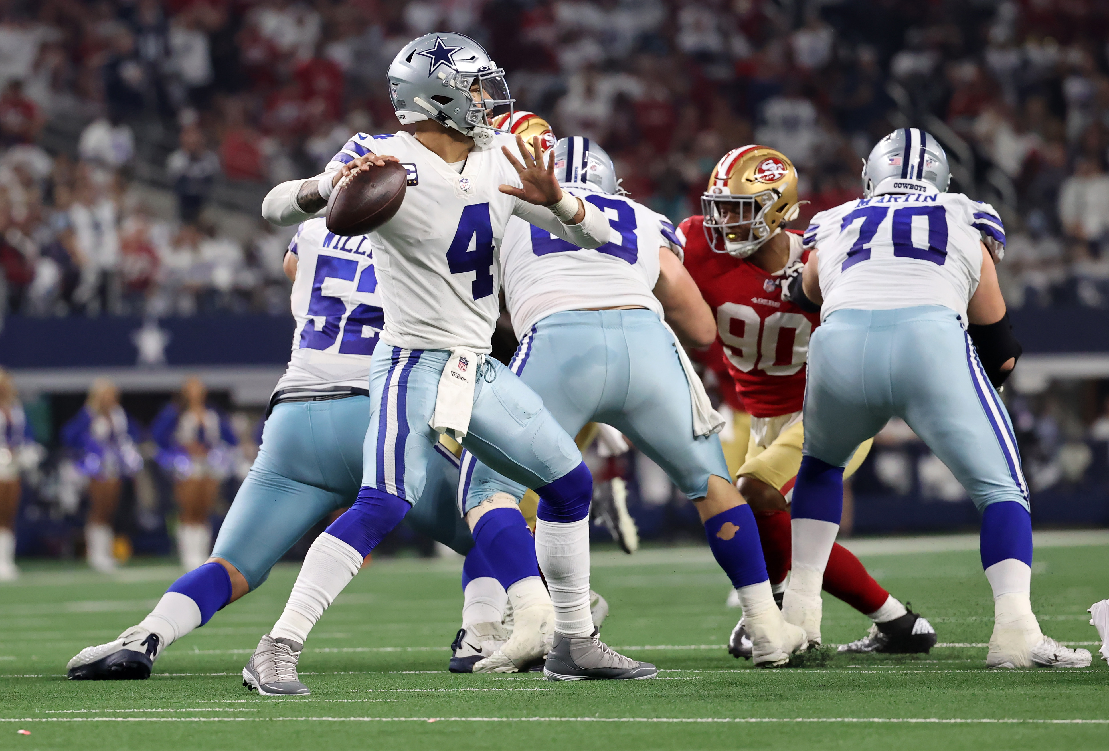 Dallas Cowboys quarterback Dak Prescott (4) attempts a pass against the San Francisco 49ers during the second half of the NFC Wild Card playoff football game at AT&amp;amp;T Stadium