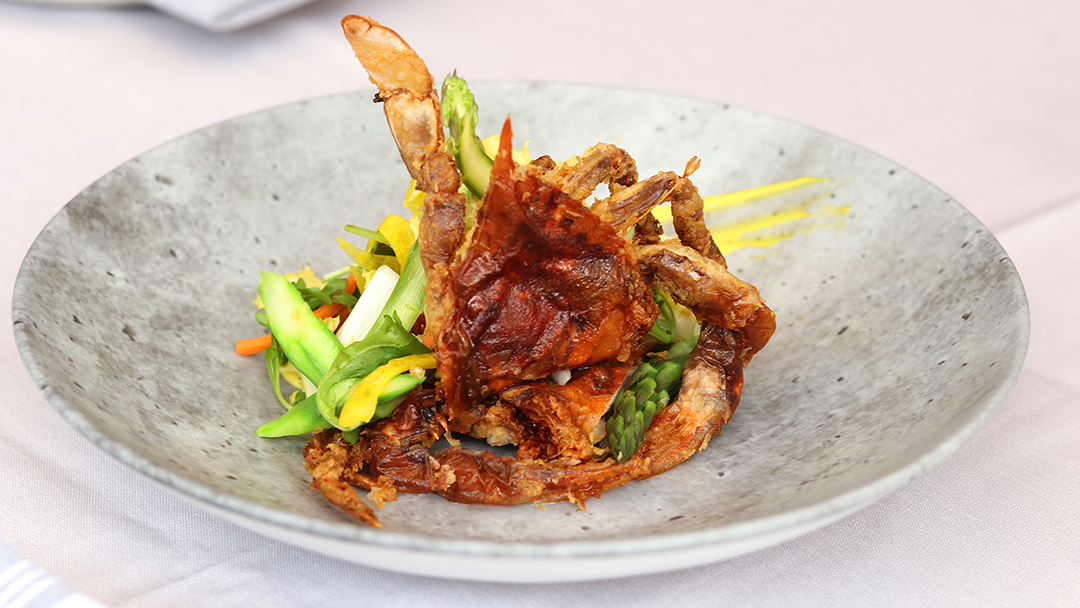 Soft shell crabs on a white plate