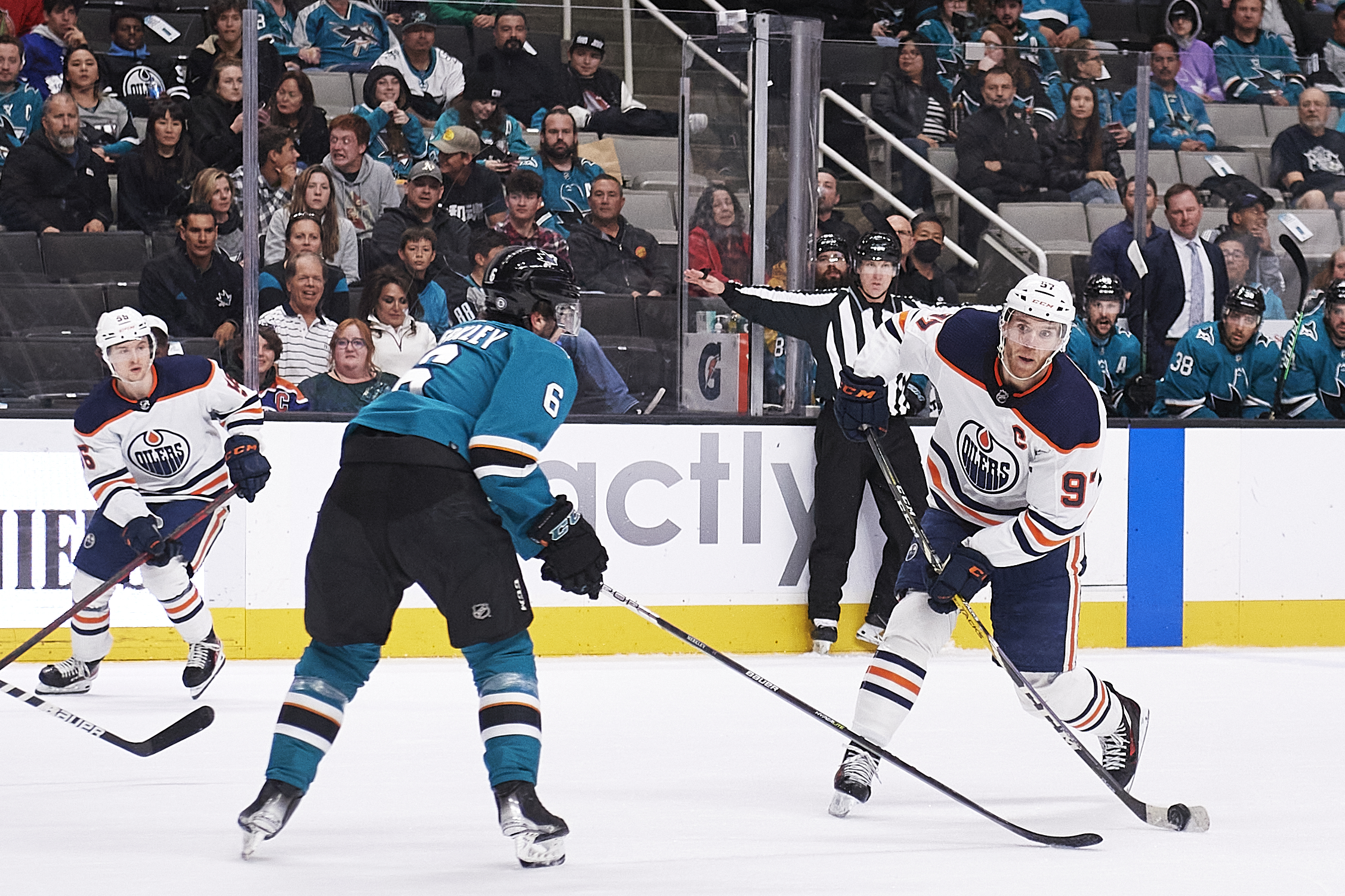 Edmonton Oilers center Connor McDavid (97) takes a shot during the NHL game between the San Jose Sharks and the Edmonton Oilers on April 5, 2022 at SAP Center in San Jose, CA.