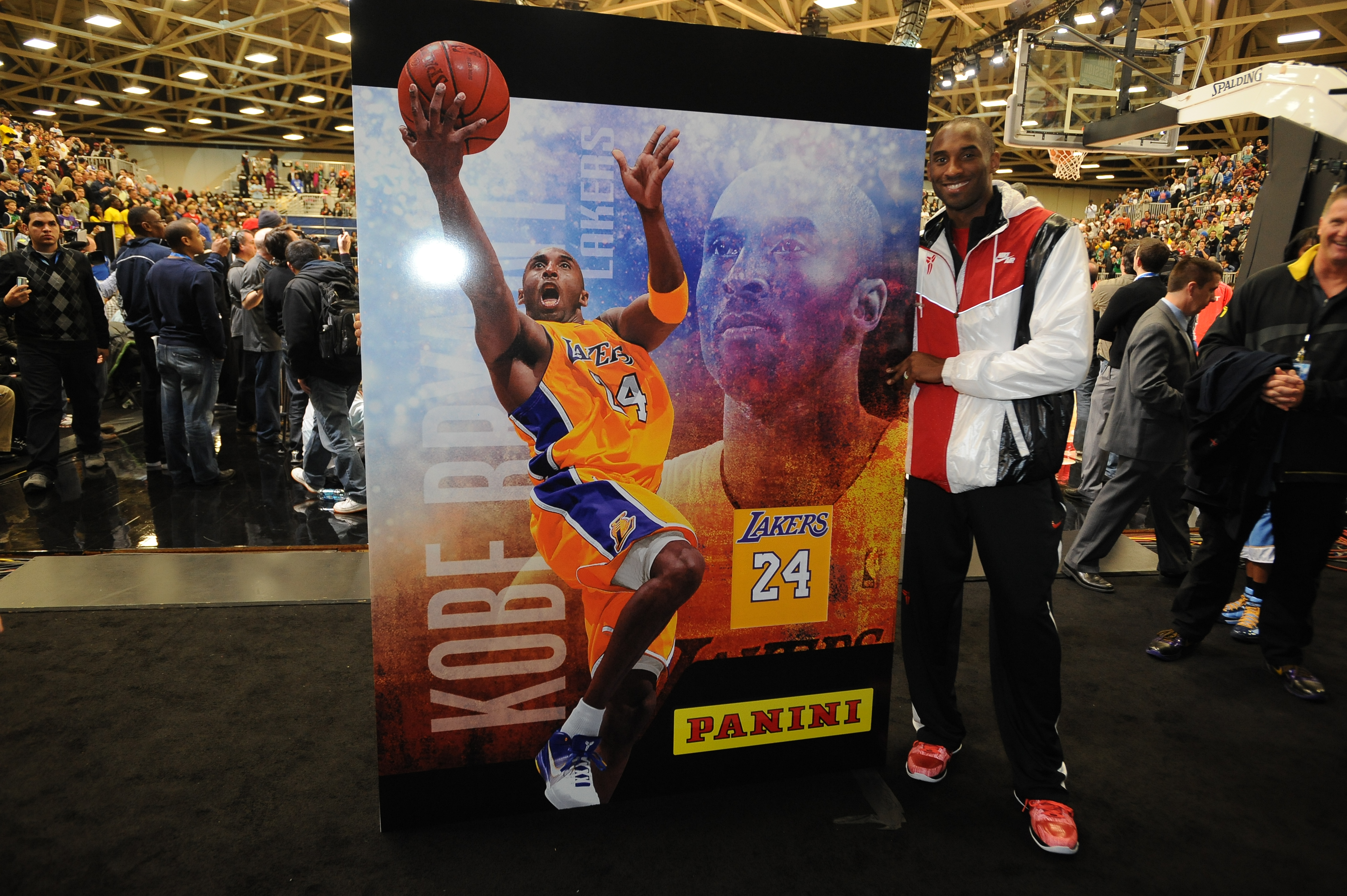 Kobe Bryant #24 of the Western Conference poses for a photo next to the world’s largest Kobe Bryant panini card during the West All-Stars Practice on center court during NBA Jam Session Presented by Adidas on February 13, 2010 at the Dallas Convention Center in Dallas, Texas.&nbsp;