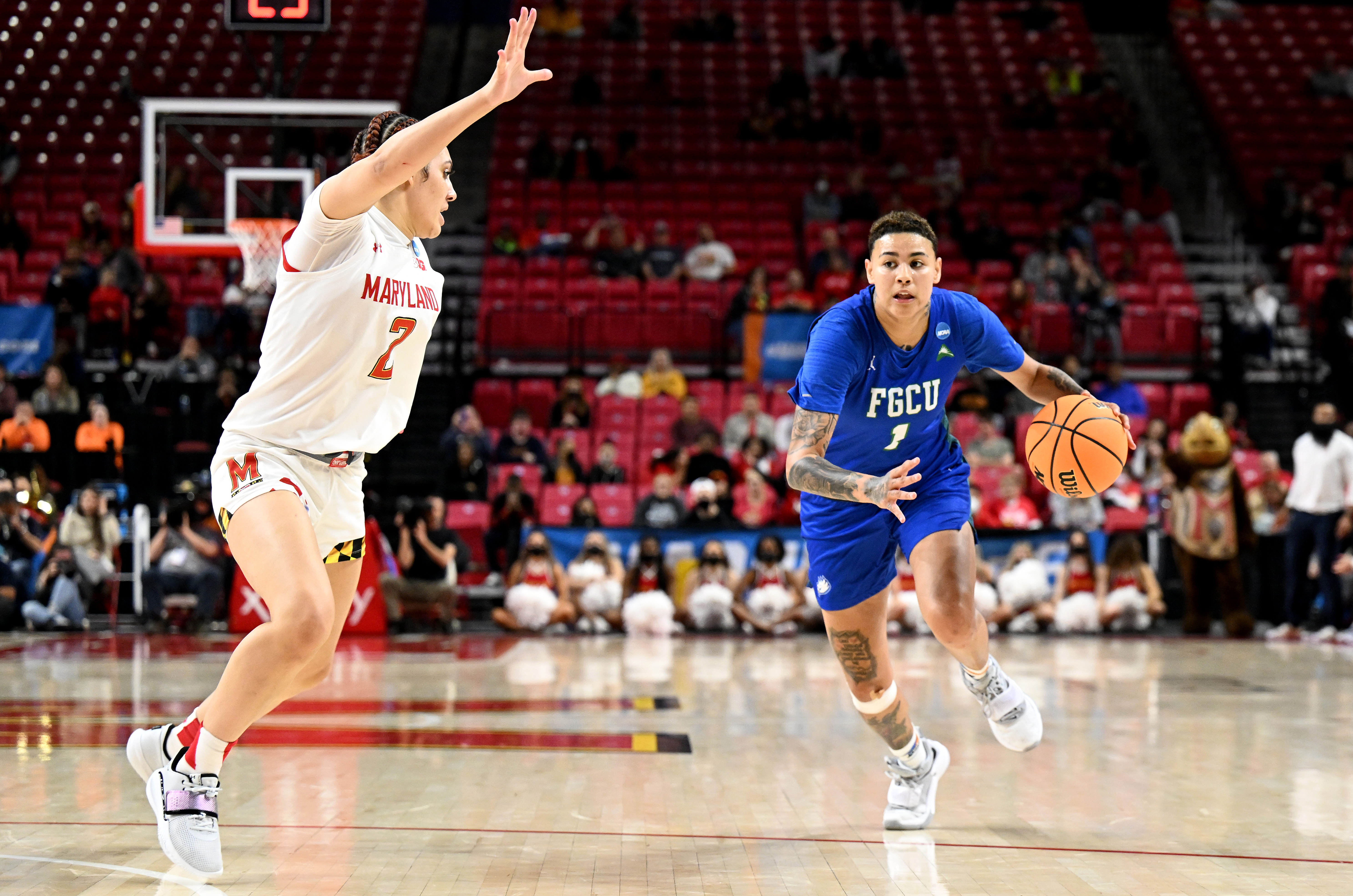 Mimi Collins of the Maryland Terrapins guards Kierstan Bell of the Florida Gulf Coast Eagles during the second round of the 2022 NCAA Women’s Basketball Tournament held at the Xfinity Center on March 20, 2022 in College Park, Maryland.