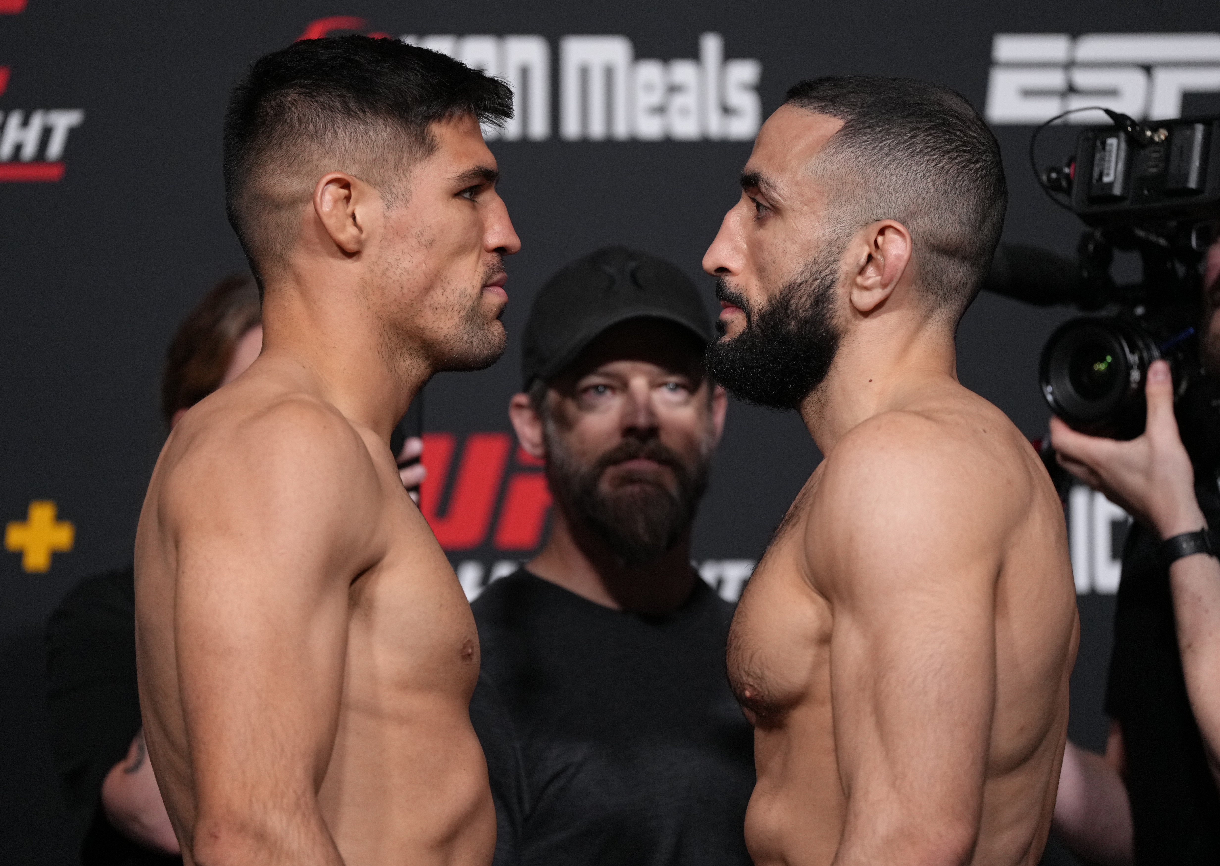 Vicente Luque and Belal Muhammad face off during the UFC weigh-in at UFC APEX on April 15, 2022 in Las Vegas, Nevada.