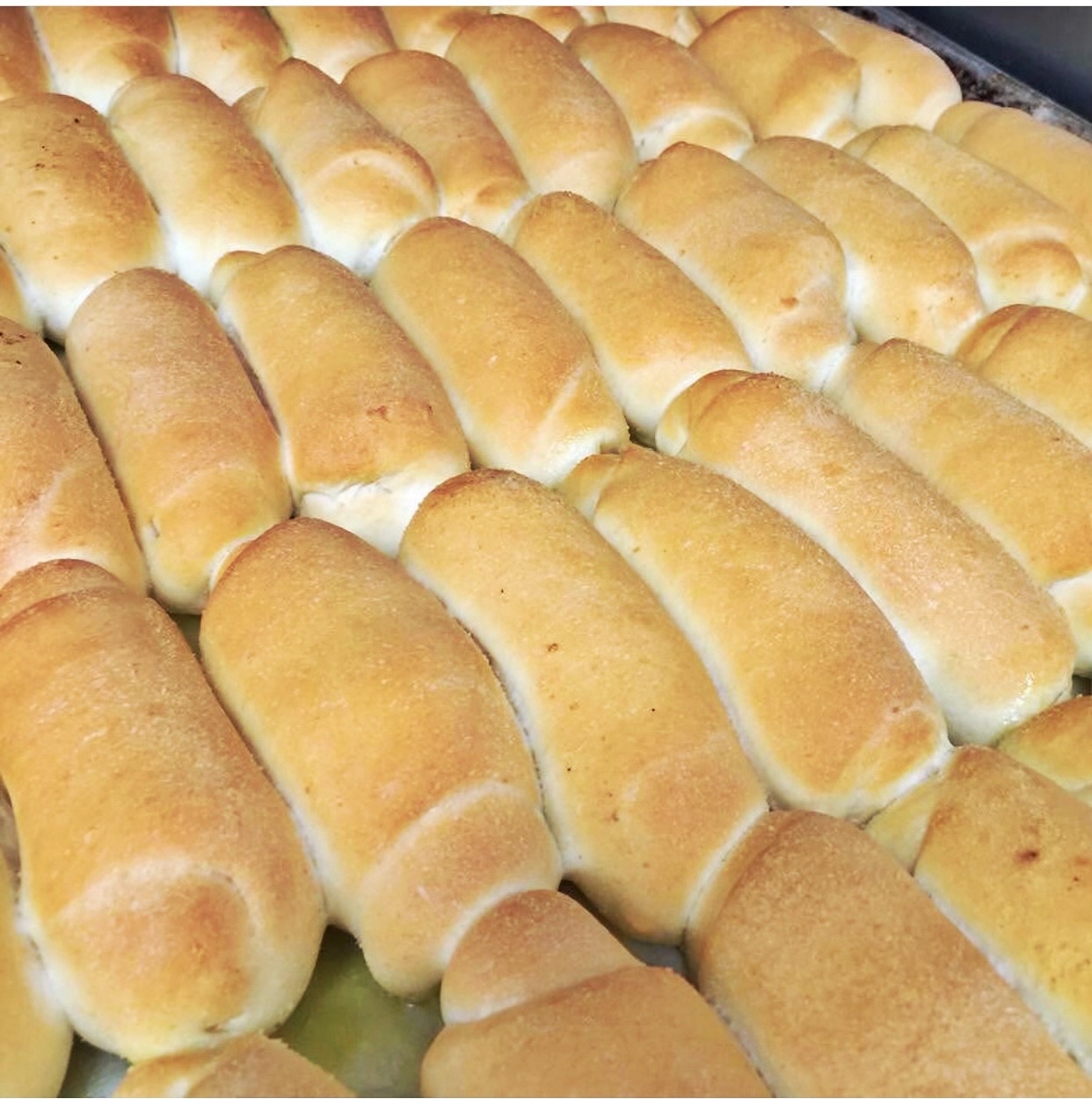 A batch of fresh bread roles.