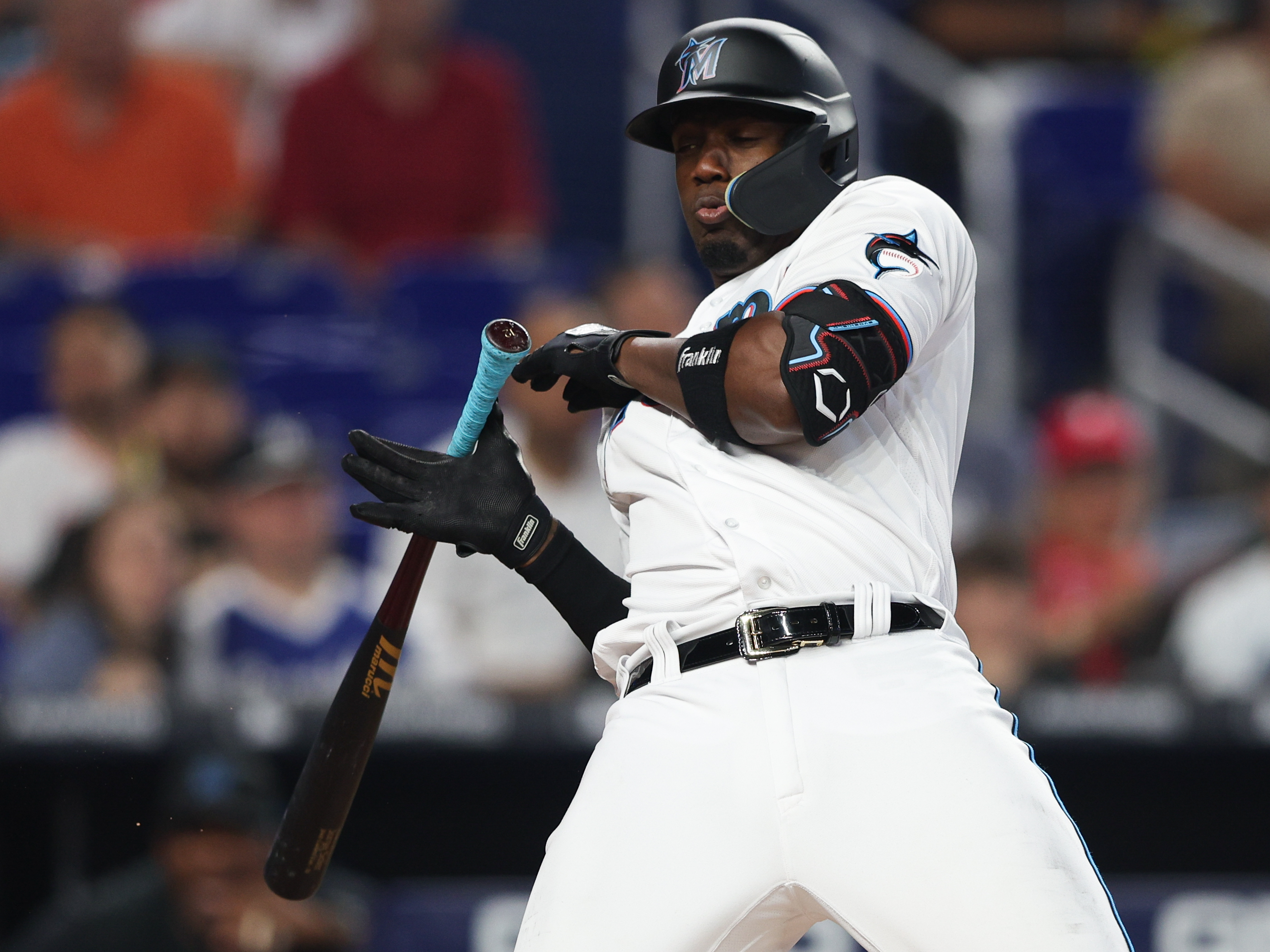 Miami Marlins right fielder Jorge Soler (12) is hit by a pitch during a game against the Philadelphia Phillies in the fourth inning at loanDepot Park.