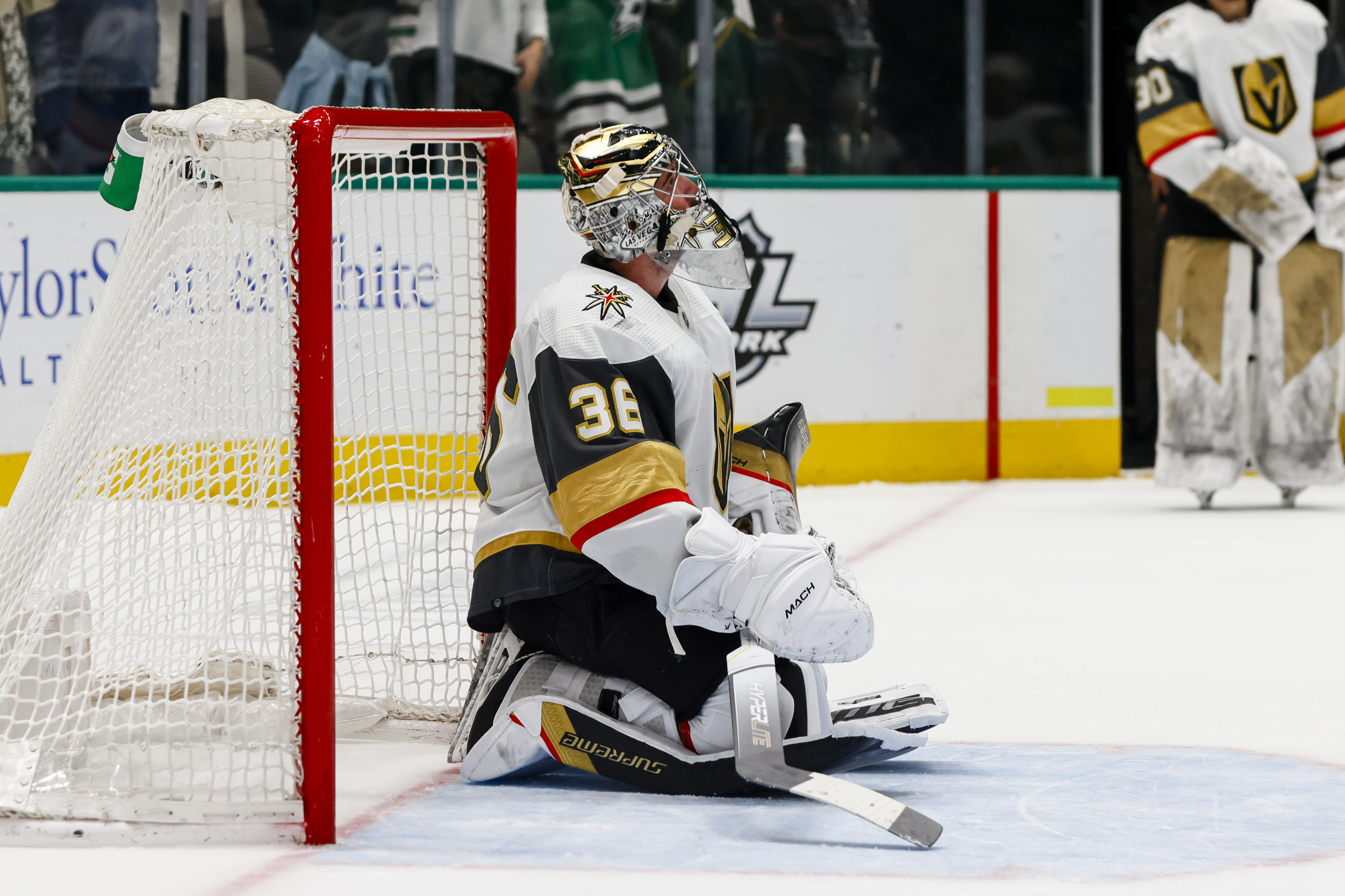 Vegas Golden Knights goaltender Logan Thompson looks up at the videoboard after giving up the game winning goal during the game between the Dallas Stars and the Vegas Golden Knights on April 26, 2022 at the American Airlines Center in Dallas, Texas.