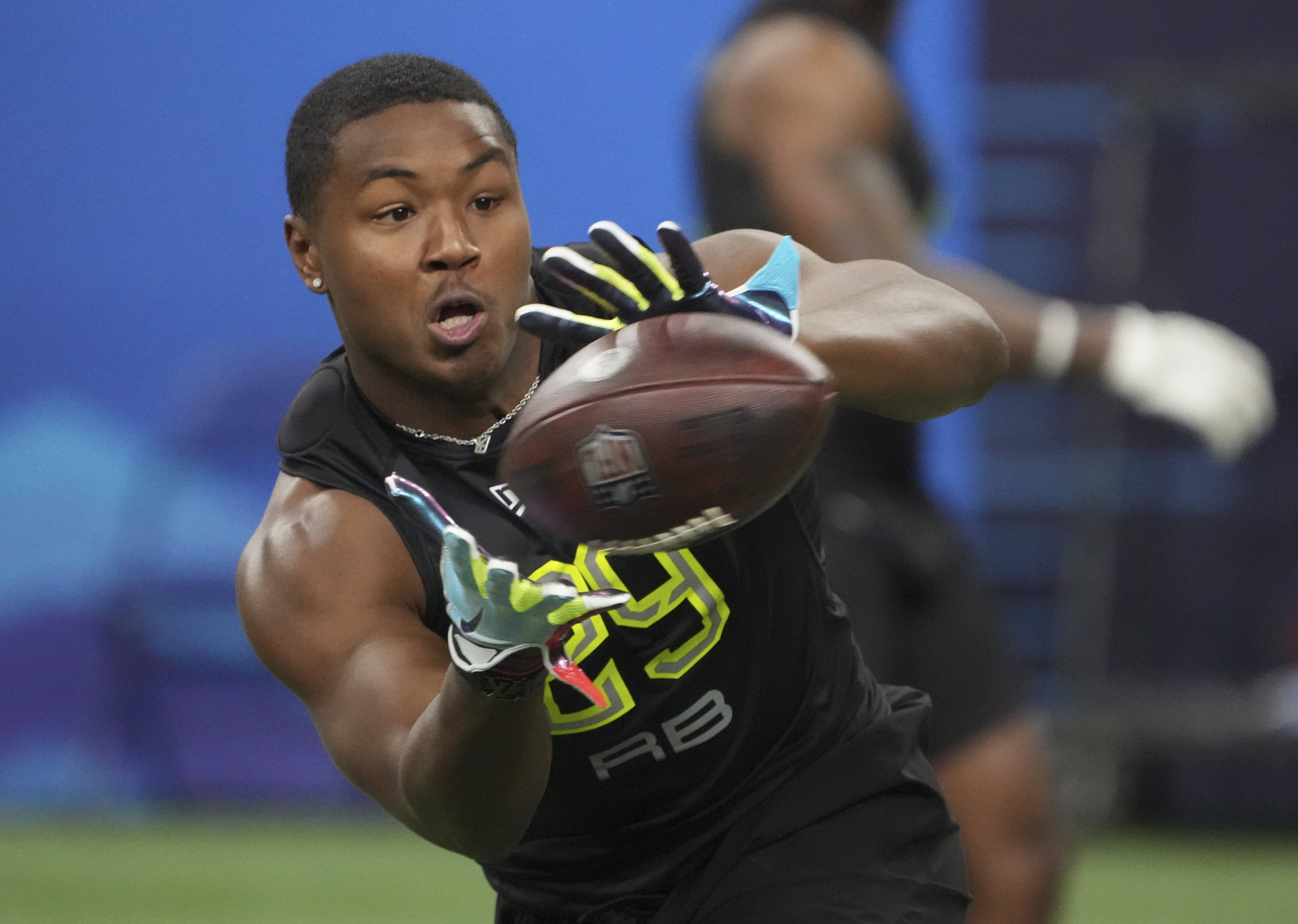 Texas A&amp;amp;M running back Isaiah Spiller (RB29) goes through drills during the 2022 NFL Scouting Combine at Lucas Oil Stadium.