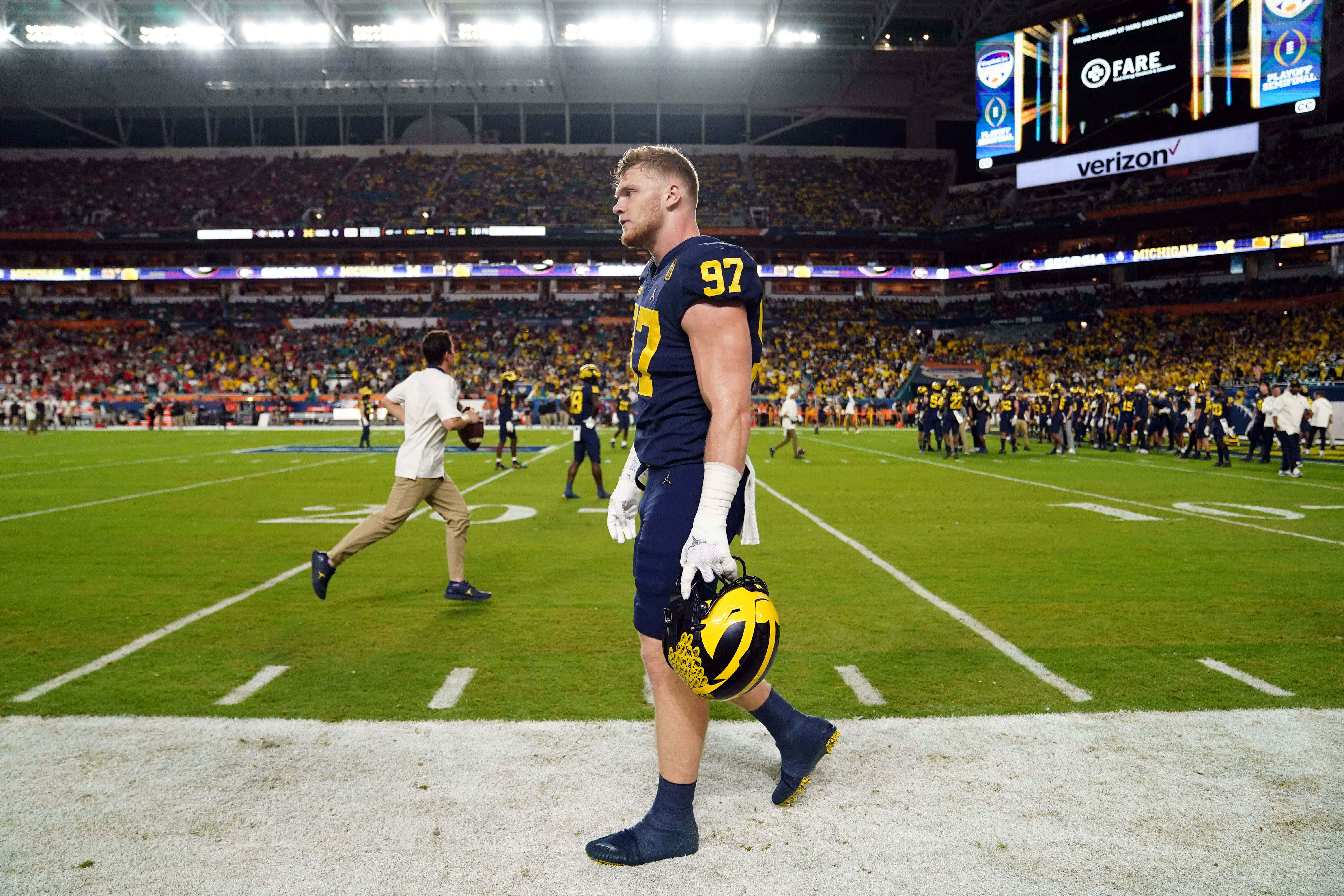 Michigan Wolverines defensive end Aidan Hutchinson (97) warms up prior to the Orange Bowl college football CFP national semifinal game against the Georgia Bulldogs at Hard Rock Stadium.