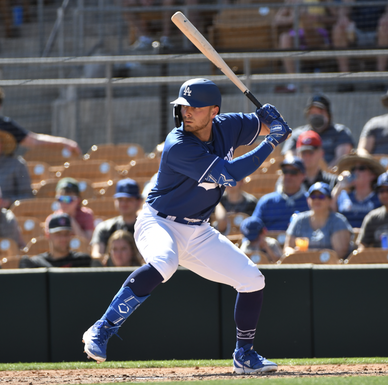 GLENDALE, AZ - MARCH 22, 2022: Michael Busch #84 of the Los Angeles Dodgers bats during the fifth inning of an MLB spring training game against the Cincinnati Reds at Camelback Ranch on March 22, 2022 in Glendale, Arizona.