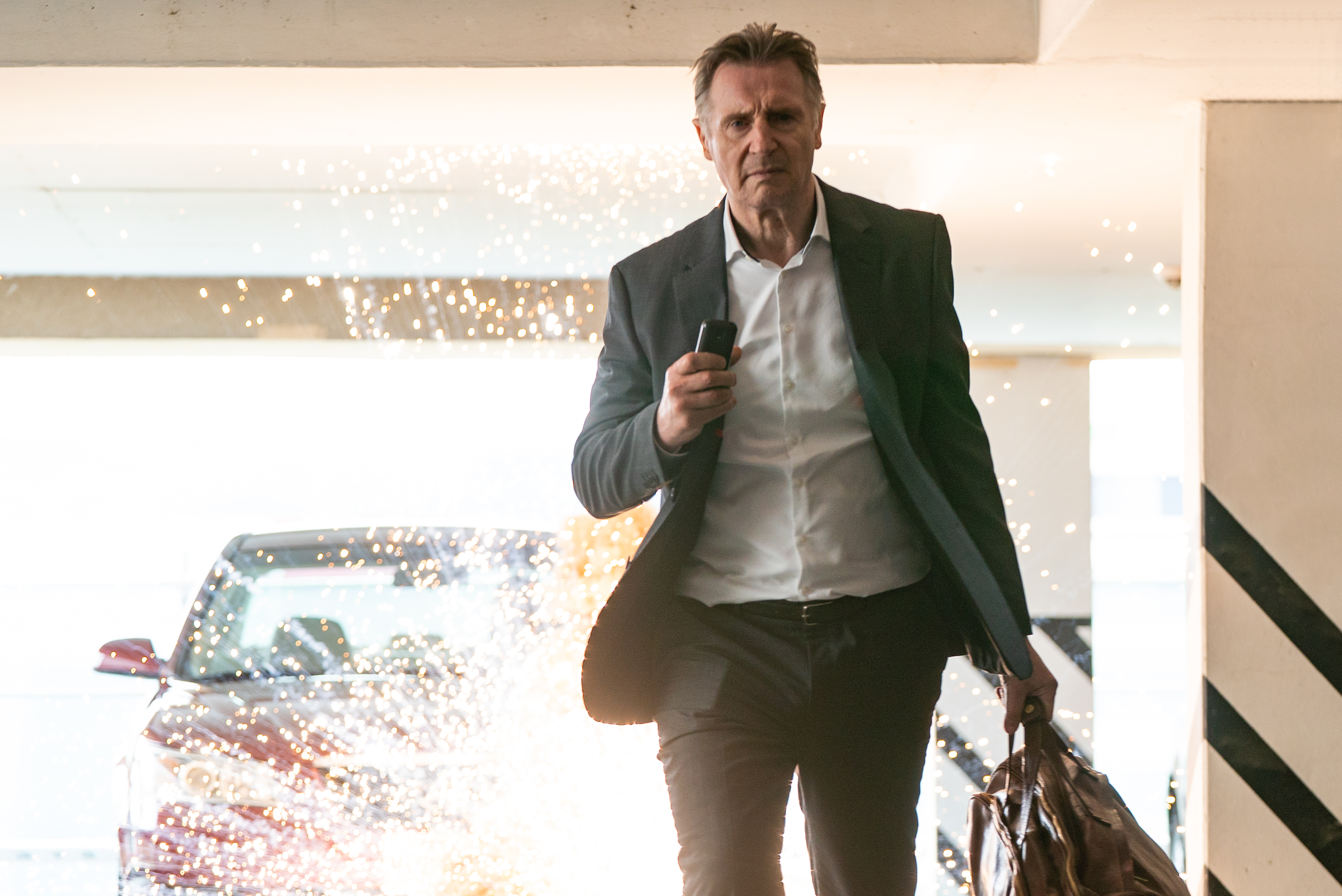 Liam Neeson walks away from an explosion, because he’s cool
