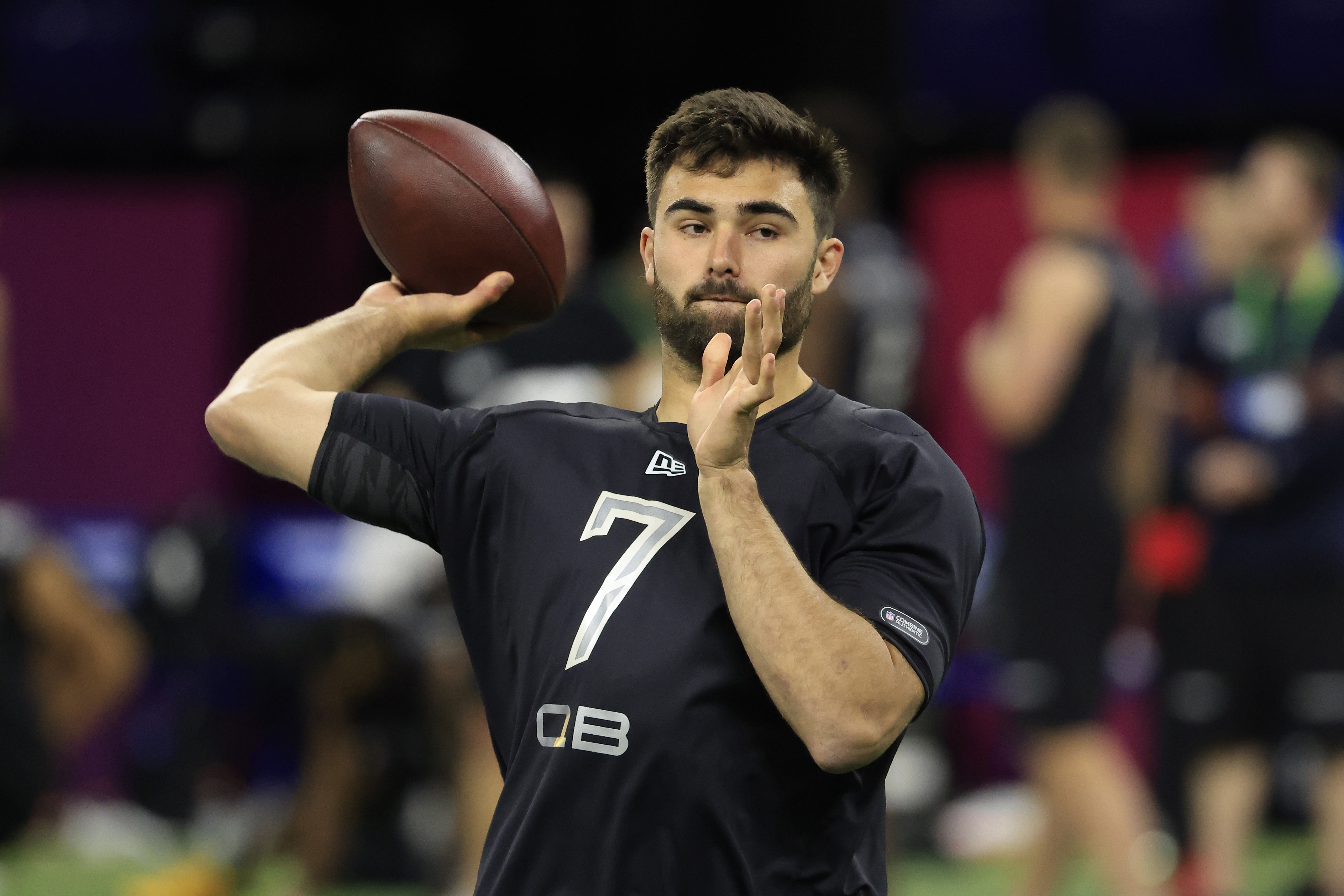 Sam Howell #QB07 of the North Carolina Tar Heels throws during the NFL Combine at Lucas Oil Stadium on March 03, 2022 in Indianapolis, Indiana.