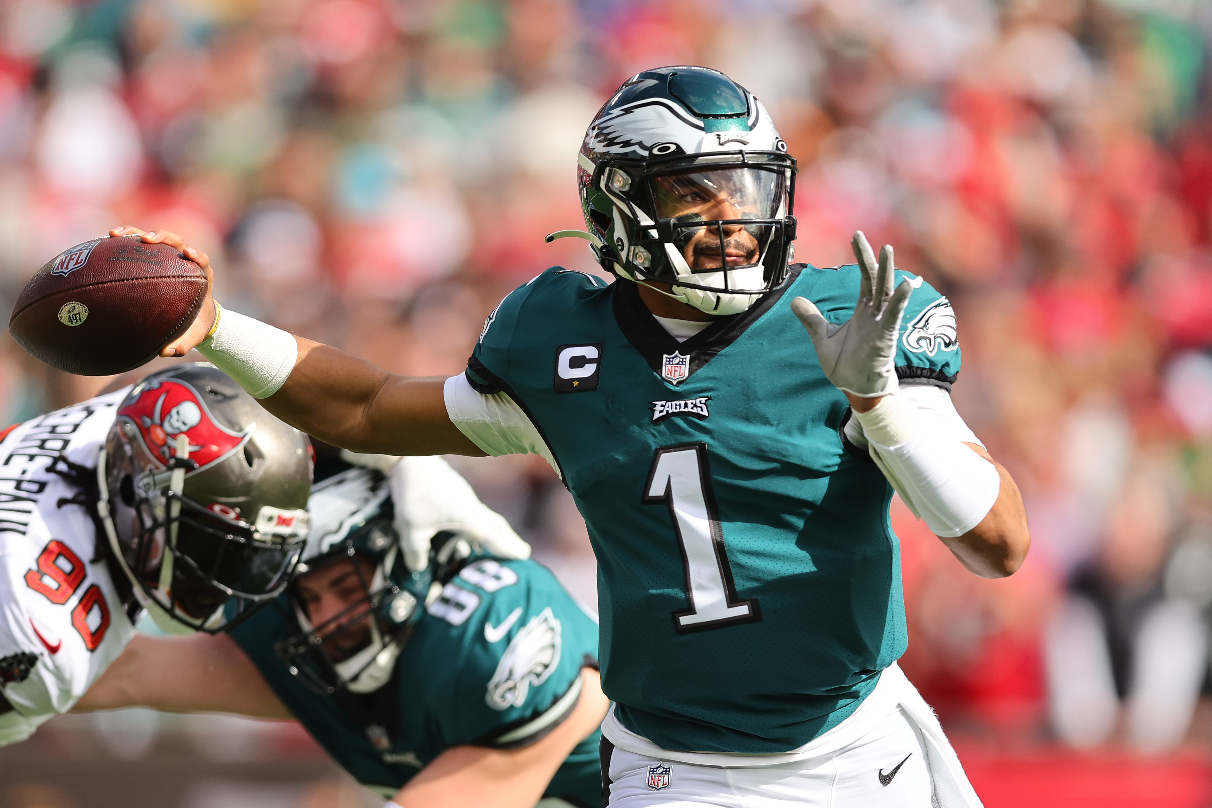 Jalen Hurts #1 of the Philadelphia Eagles in action against the Tampa Bay Buccaneers in the first half of the NFC Wild Card Playoff game at Raymond James Stadium on January 16, 2022 in Tampa, Florida.