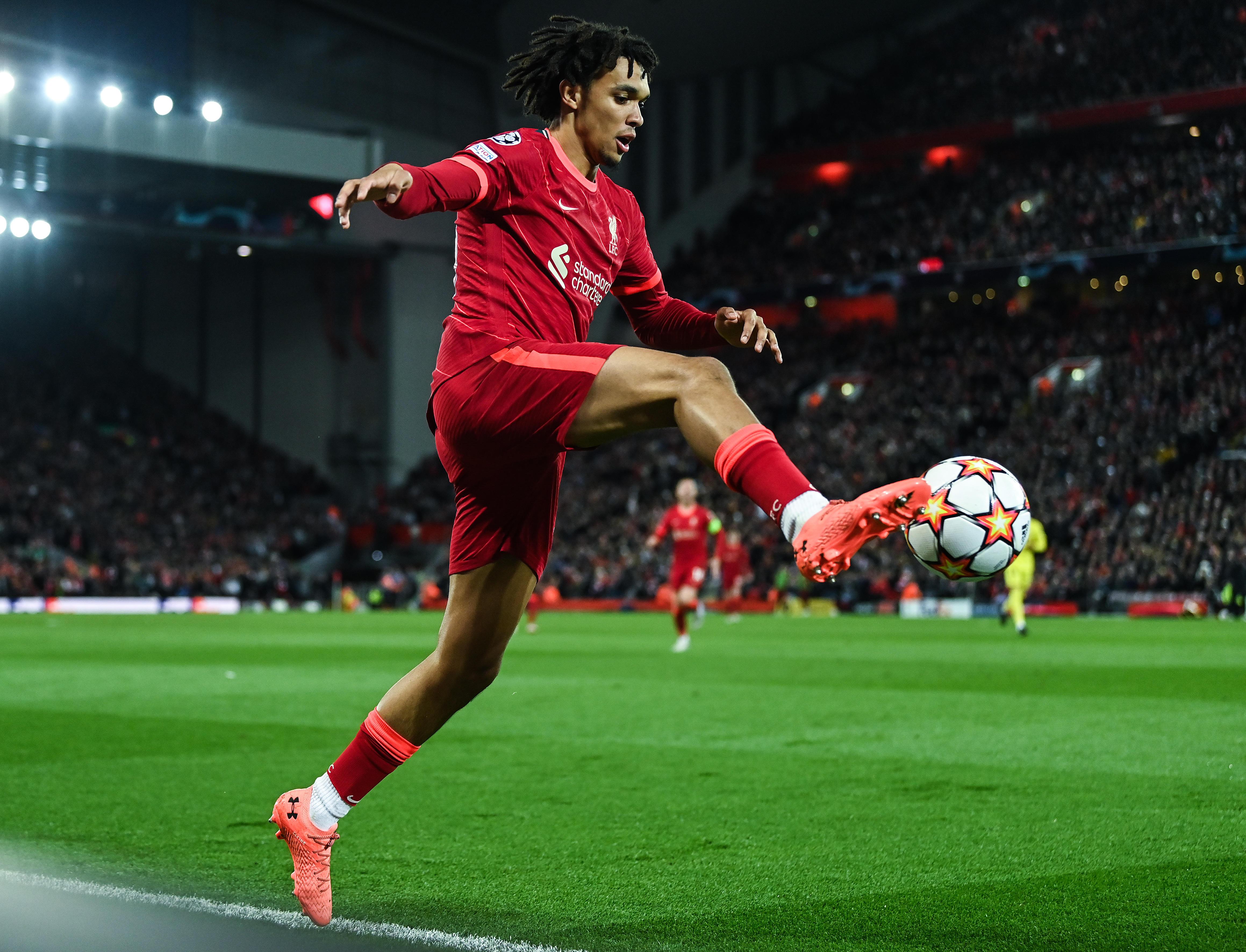 Trent Alexander-Arnold of Liverpool runs with the ball during the UEFA Champions League Semi Final Leg One match between Liverpool and Villarreal at Anfield on April 27, 2022 in Liverpool, England.