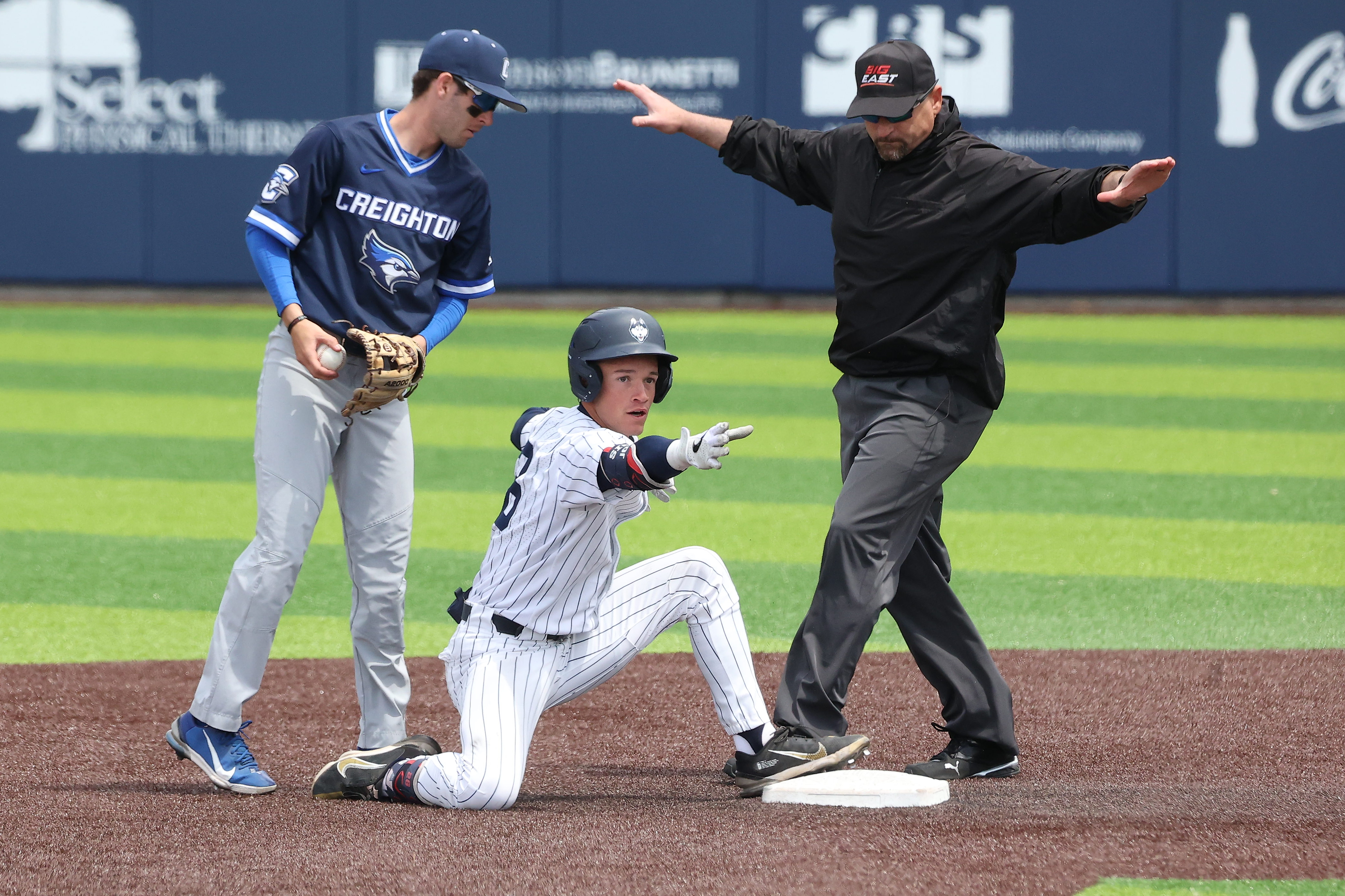 UConn’s T.C. Simmons #26 celebrates after his run-scoring double in the 6th inning vs Creighton on Sunday afternoon.